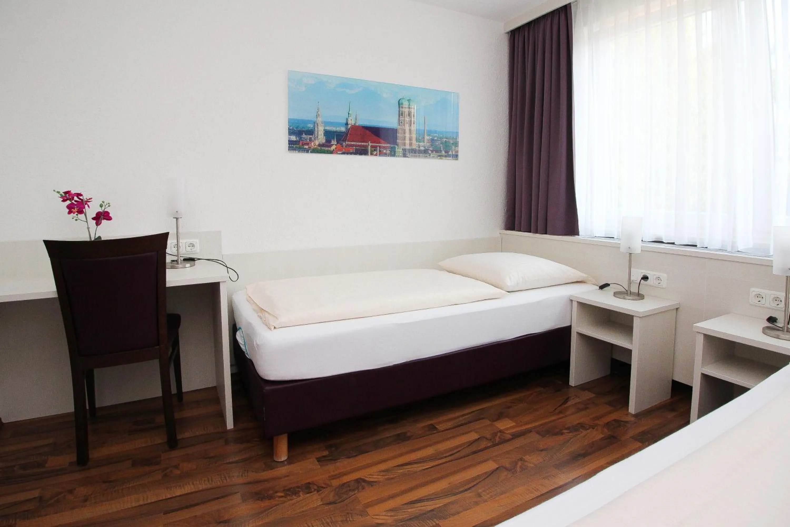 Bed in Hotel Olympia