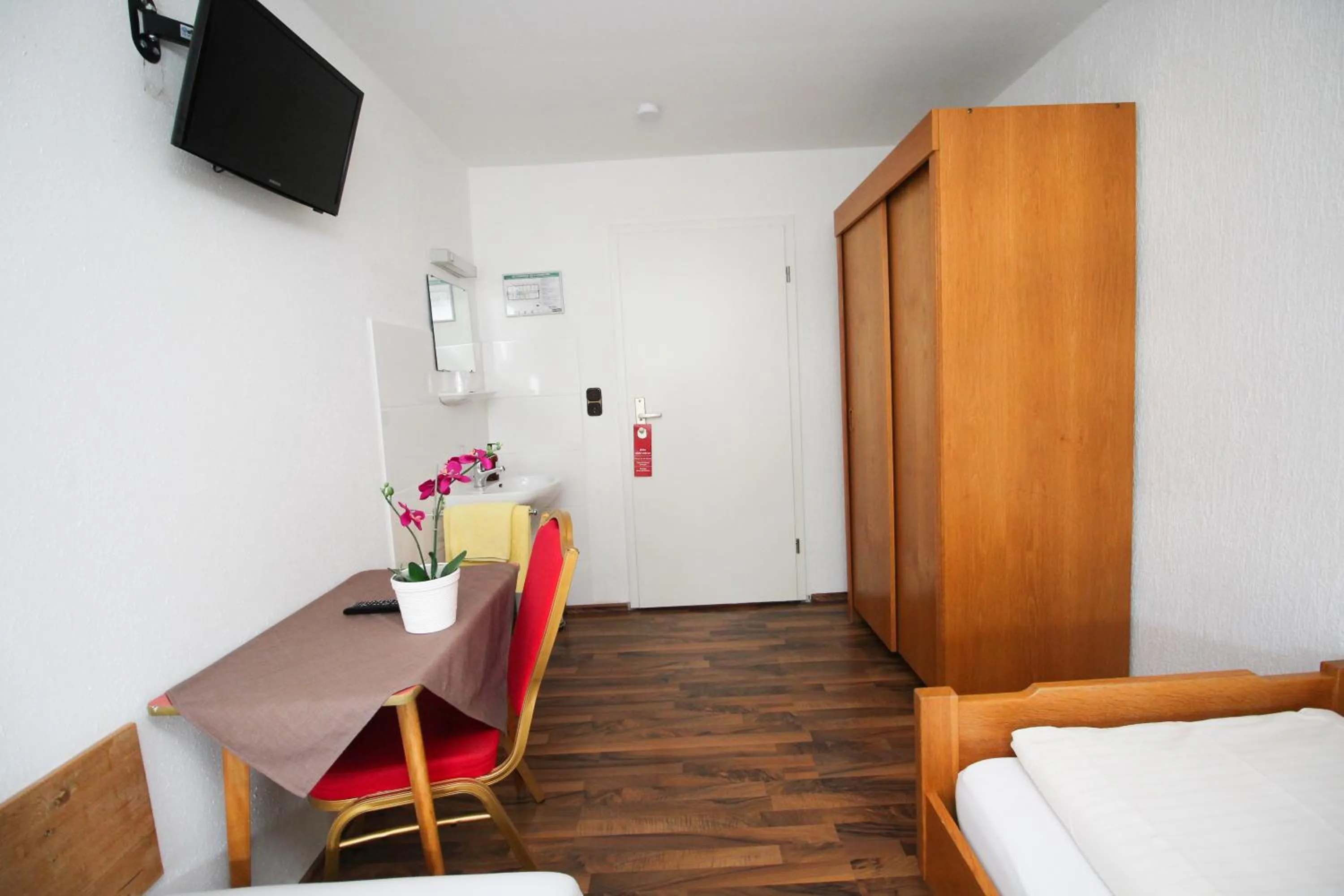 Bed in Hotel Olympia