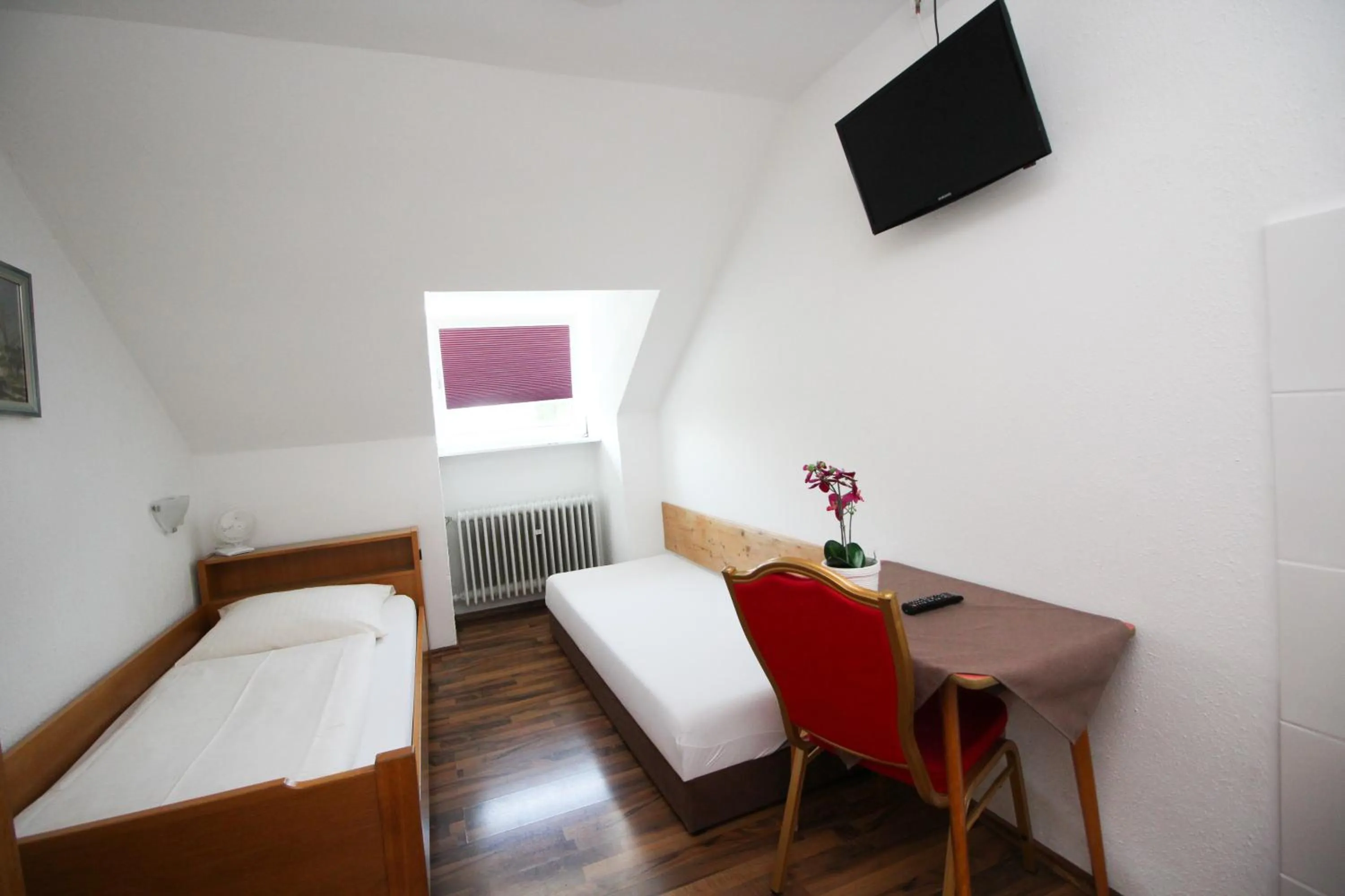 Bed in Hotel Olympia