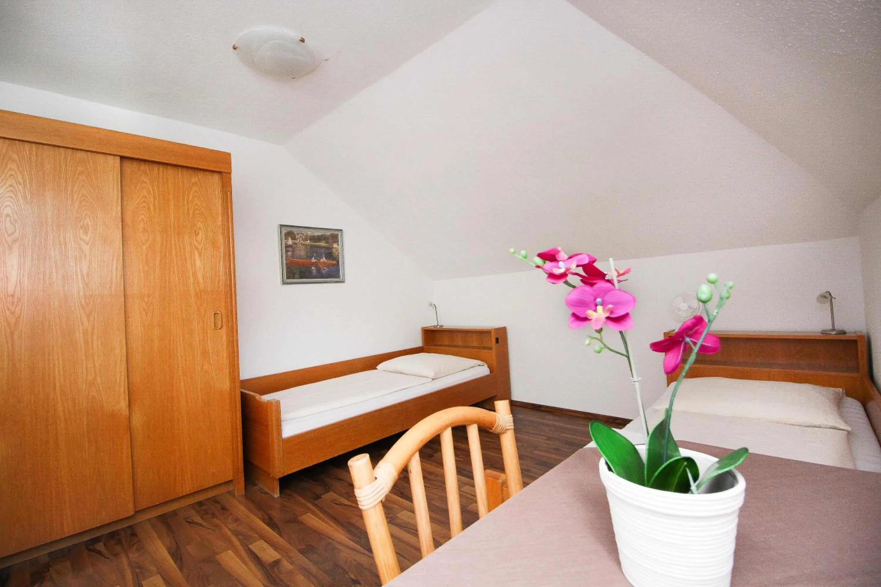 Bed in Hotel Olympia