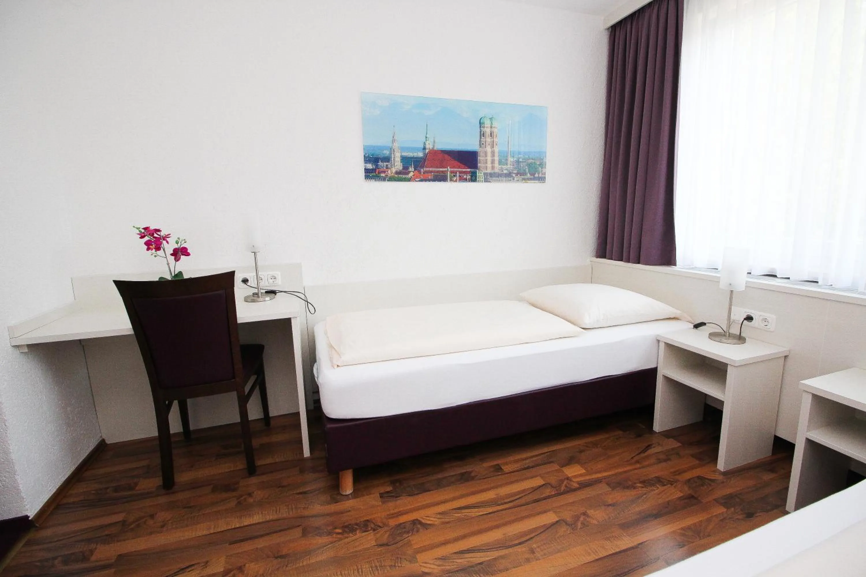 Bed in Hotel Olympia