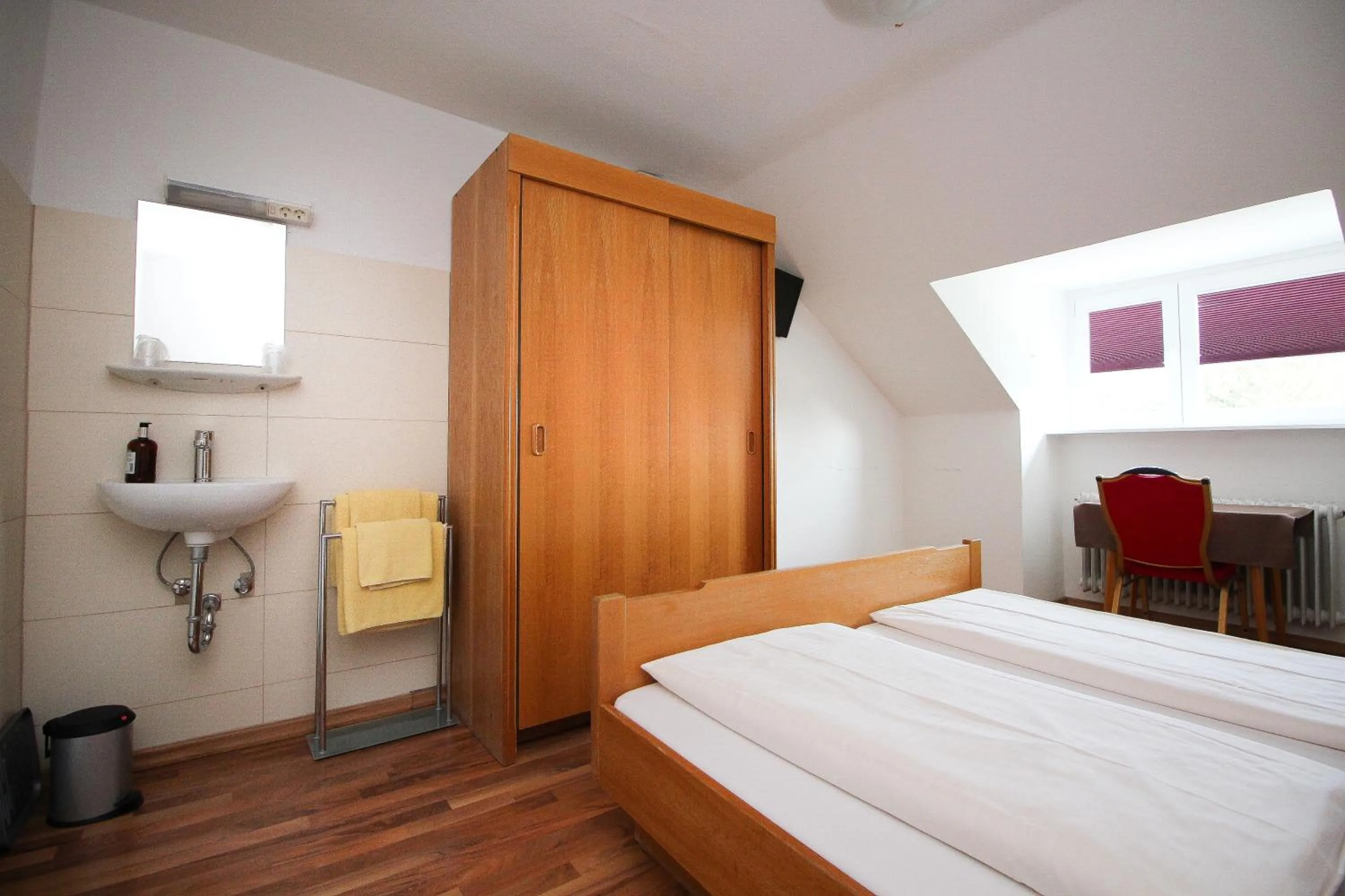 Bed in Hotel Olympia