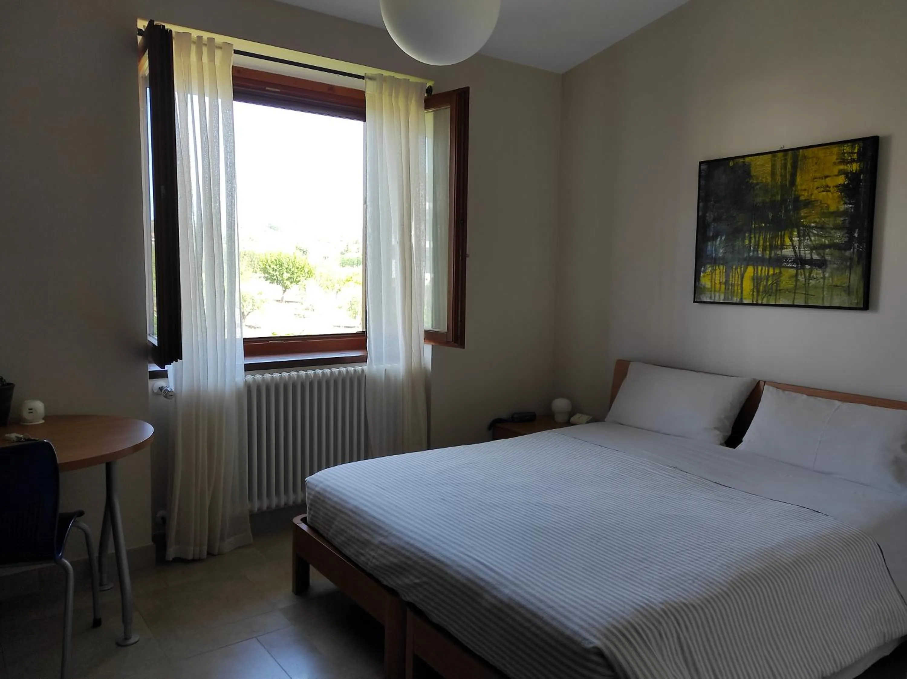 Photo of the whole room, Bed in Il Melograno