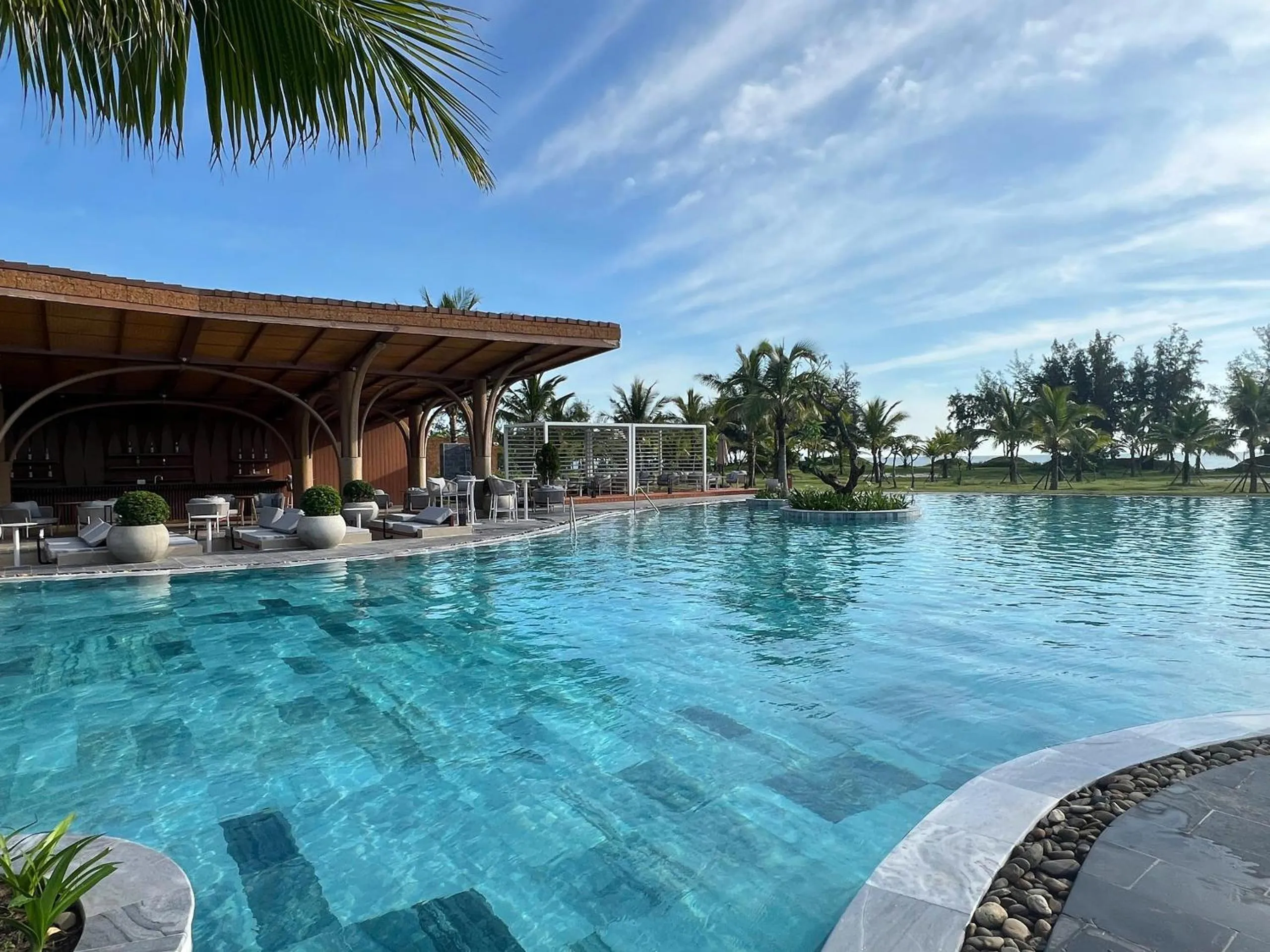 Swimming pool in voco Quang Binh Resort by IHG