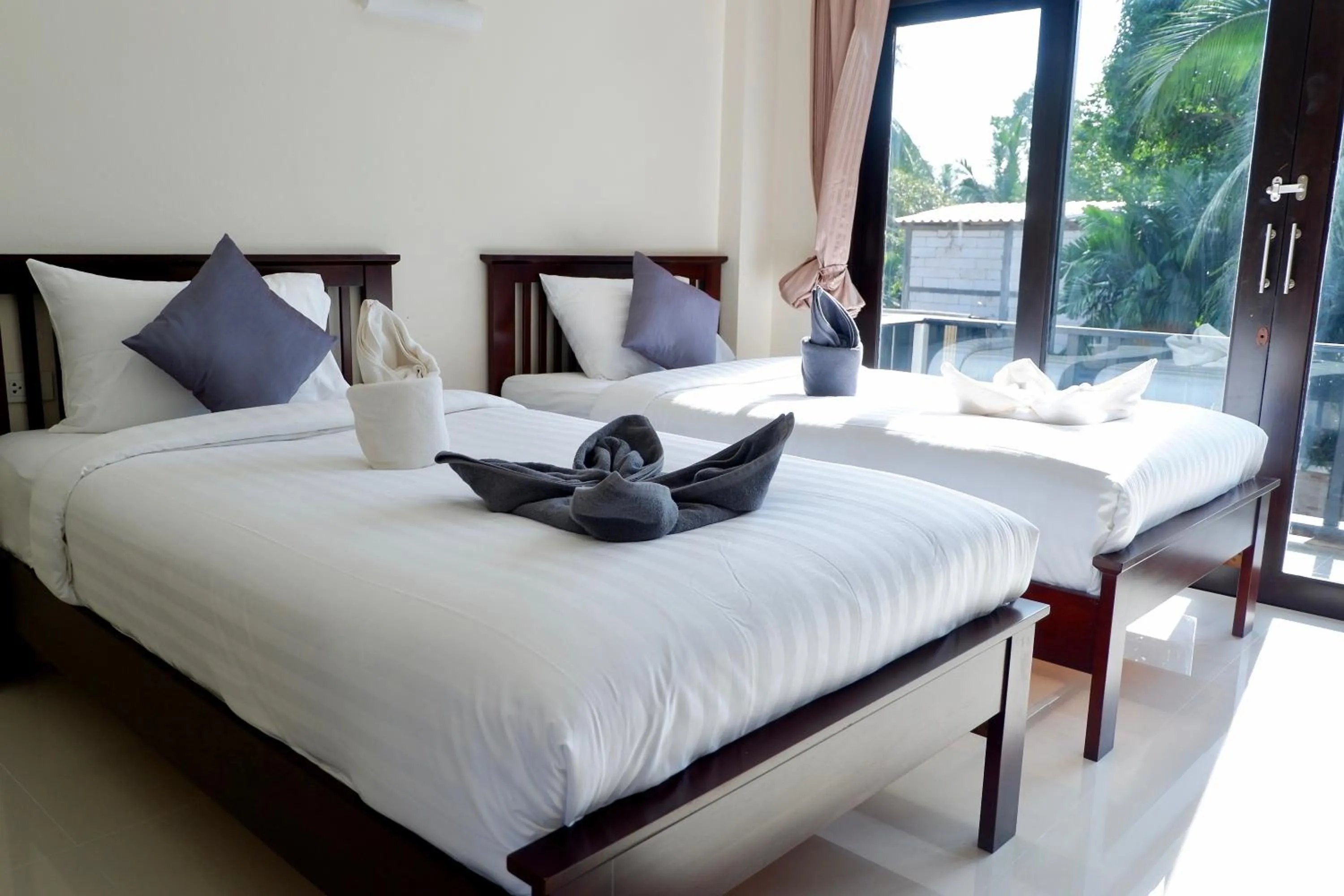 Bed in Aiya Resort Koh-Tao