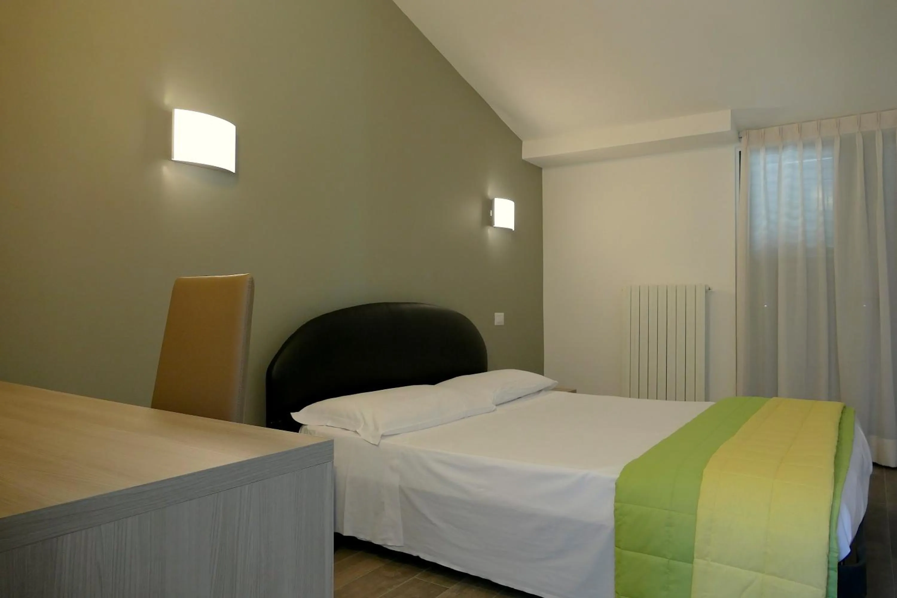 Bed in Hotel Désirée