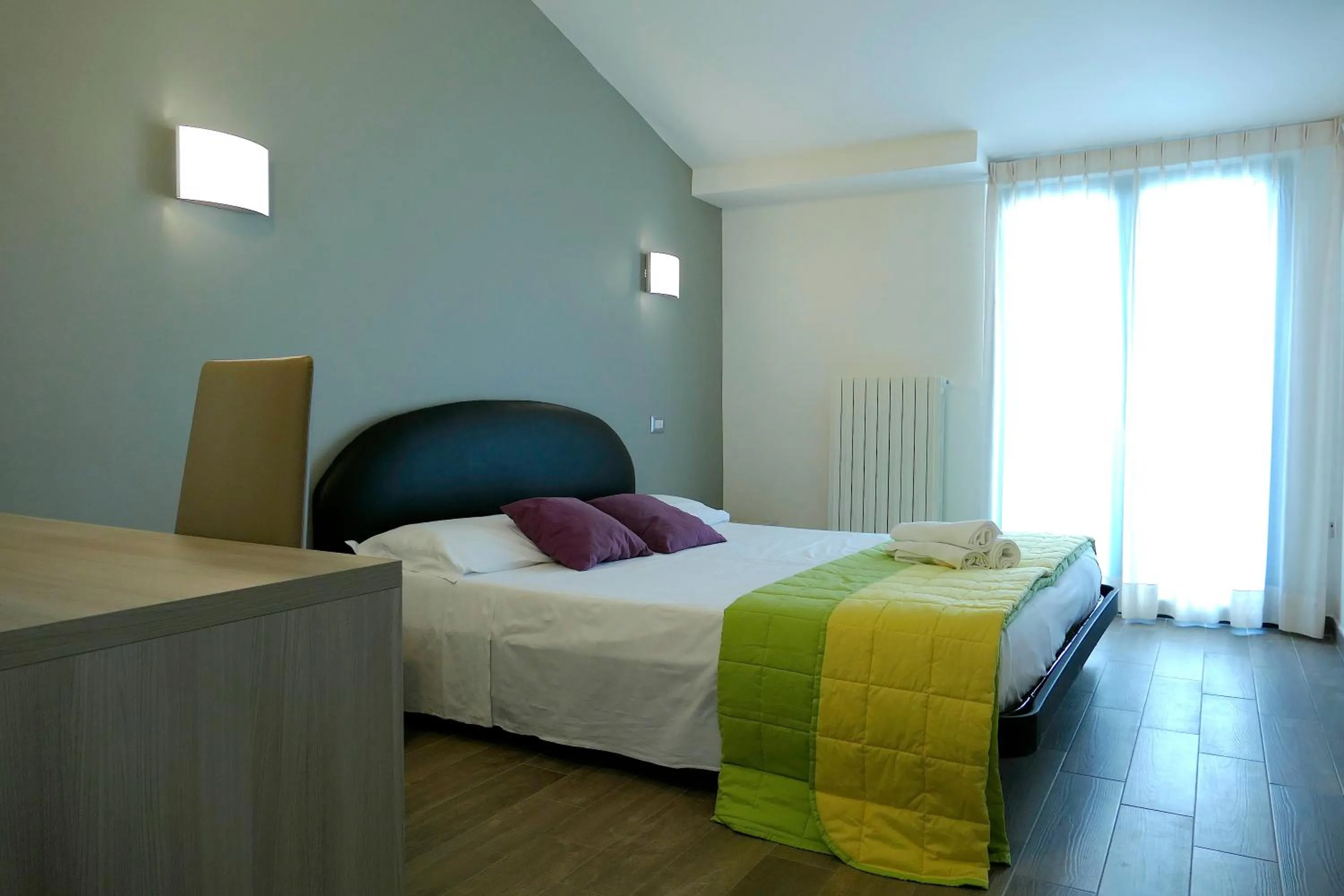 Photo of the whole room, Bed in Hotel Désirée