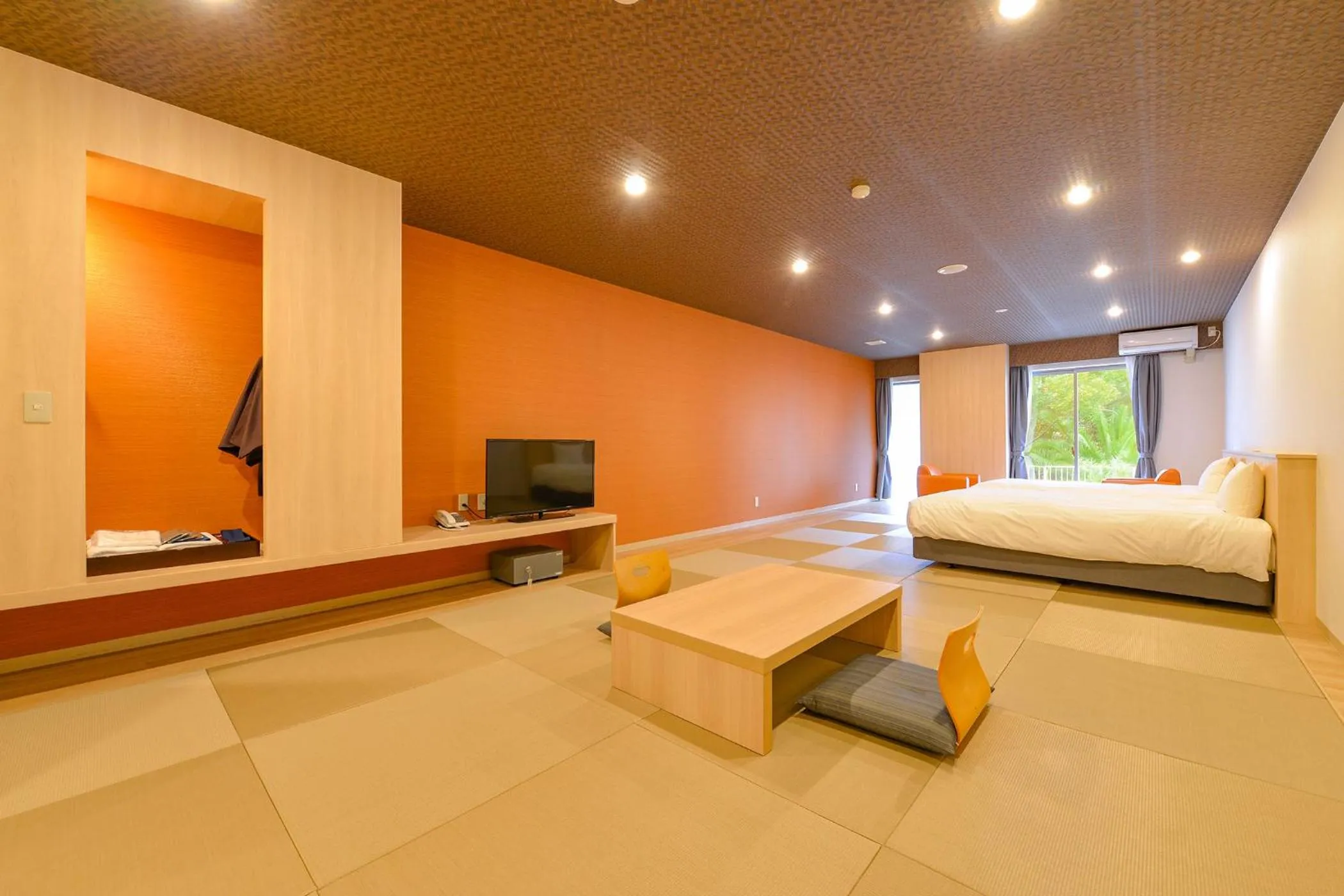 Bed in Ooedo Onsen Monogatari Hotel Suiyotei