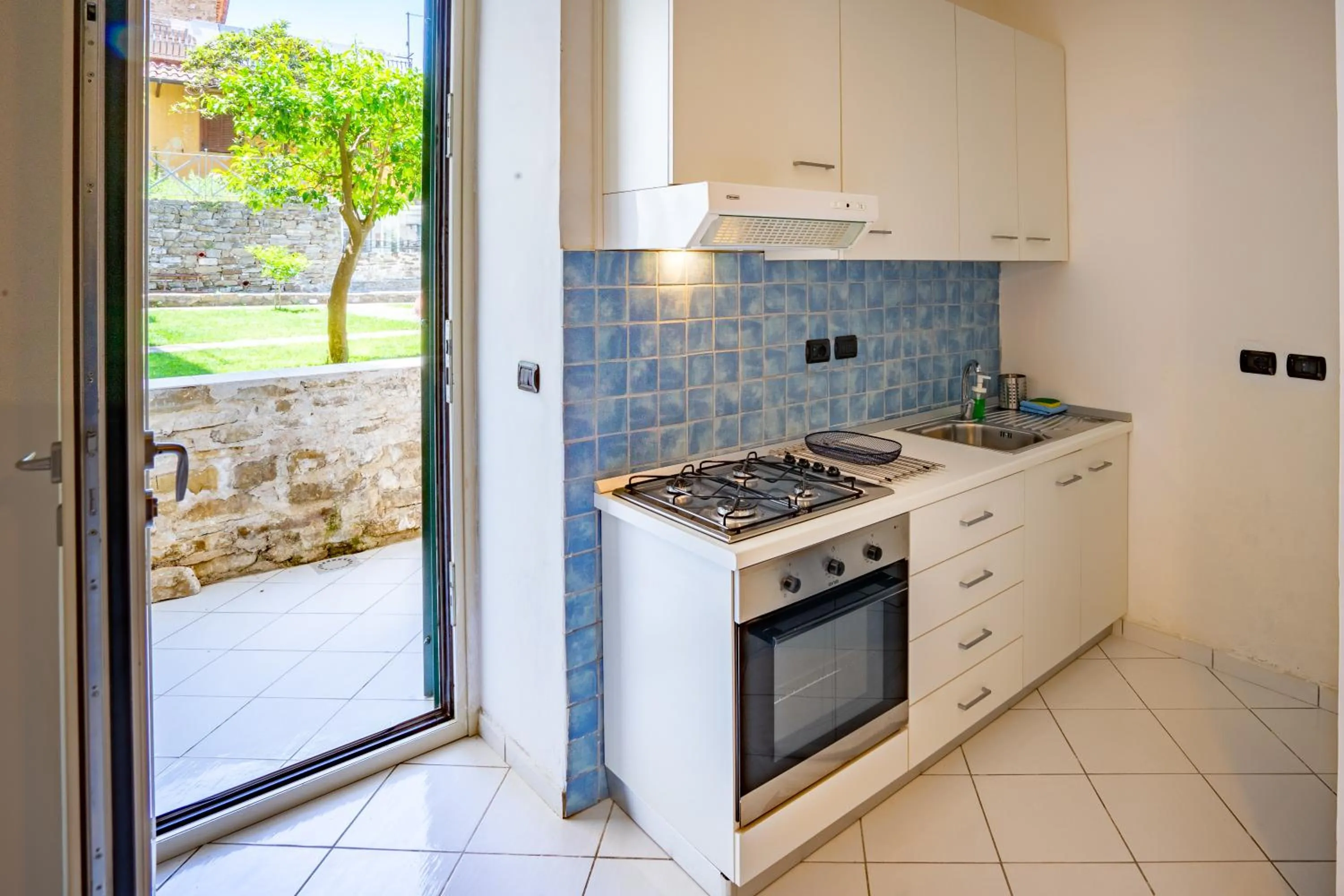 Kitchen or kitchenette in Borgo Dei Saraceni - Suites & Apartments