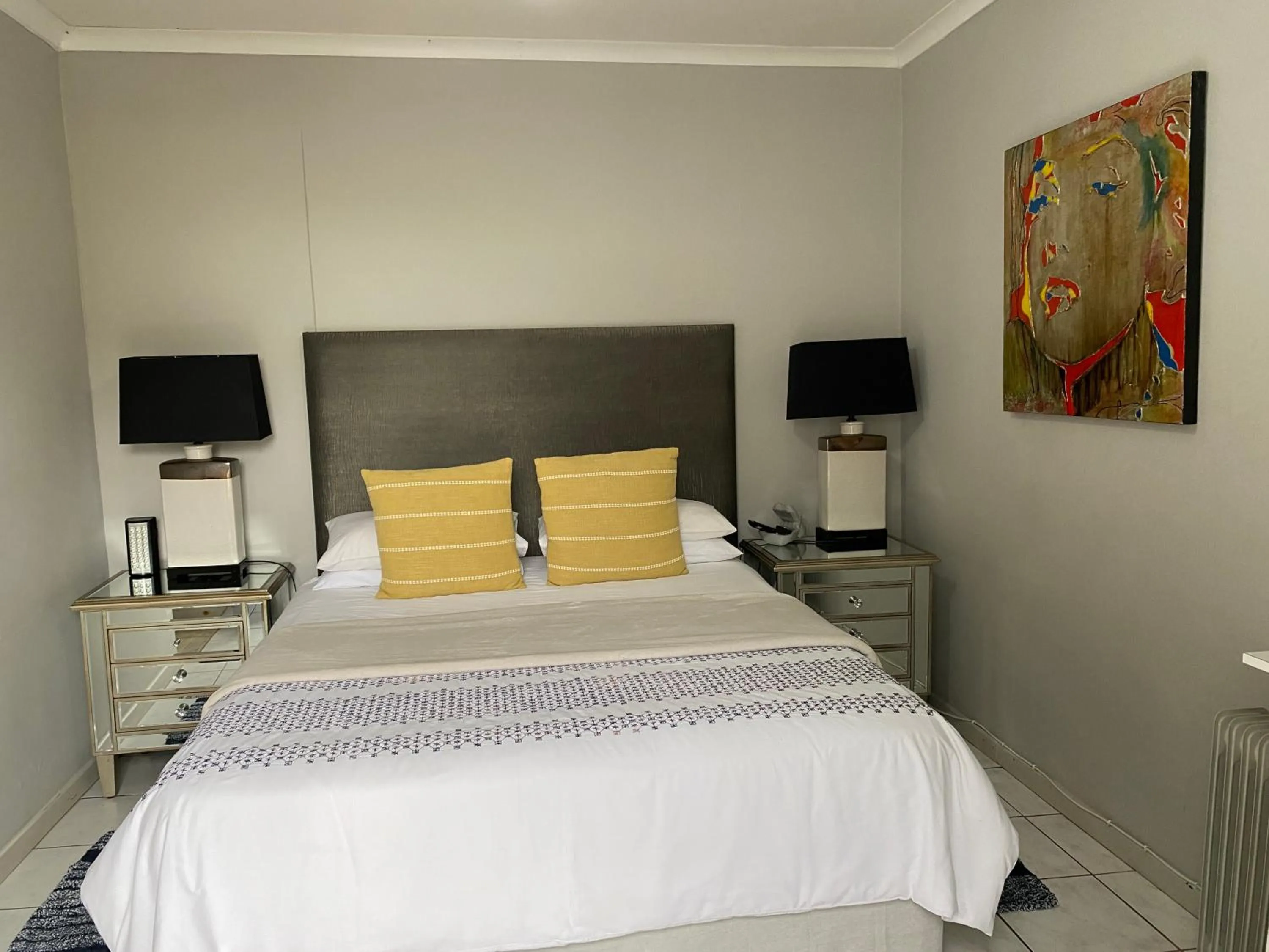 Bed in AfricaLove Guest Condo