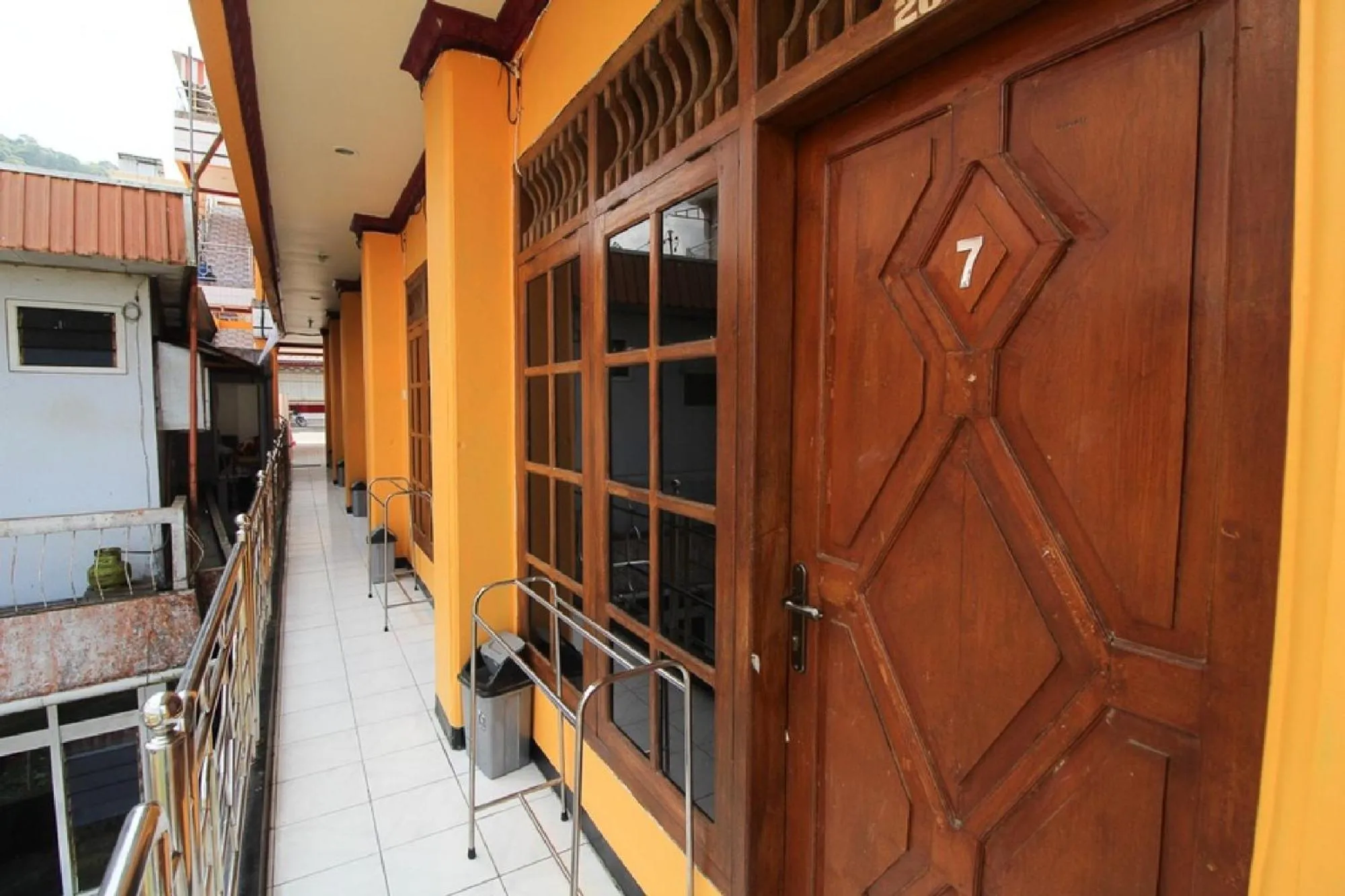 Facade/entrance in RedDoorz near Sarangan Lake