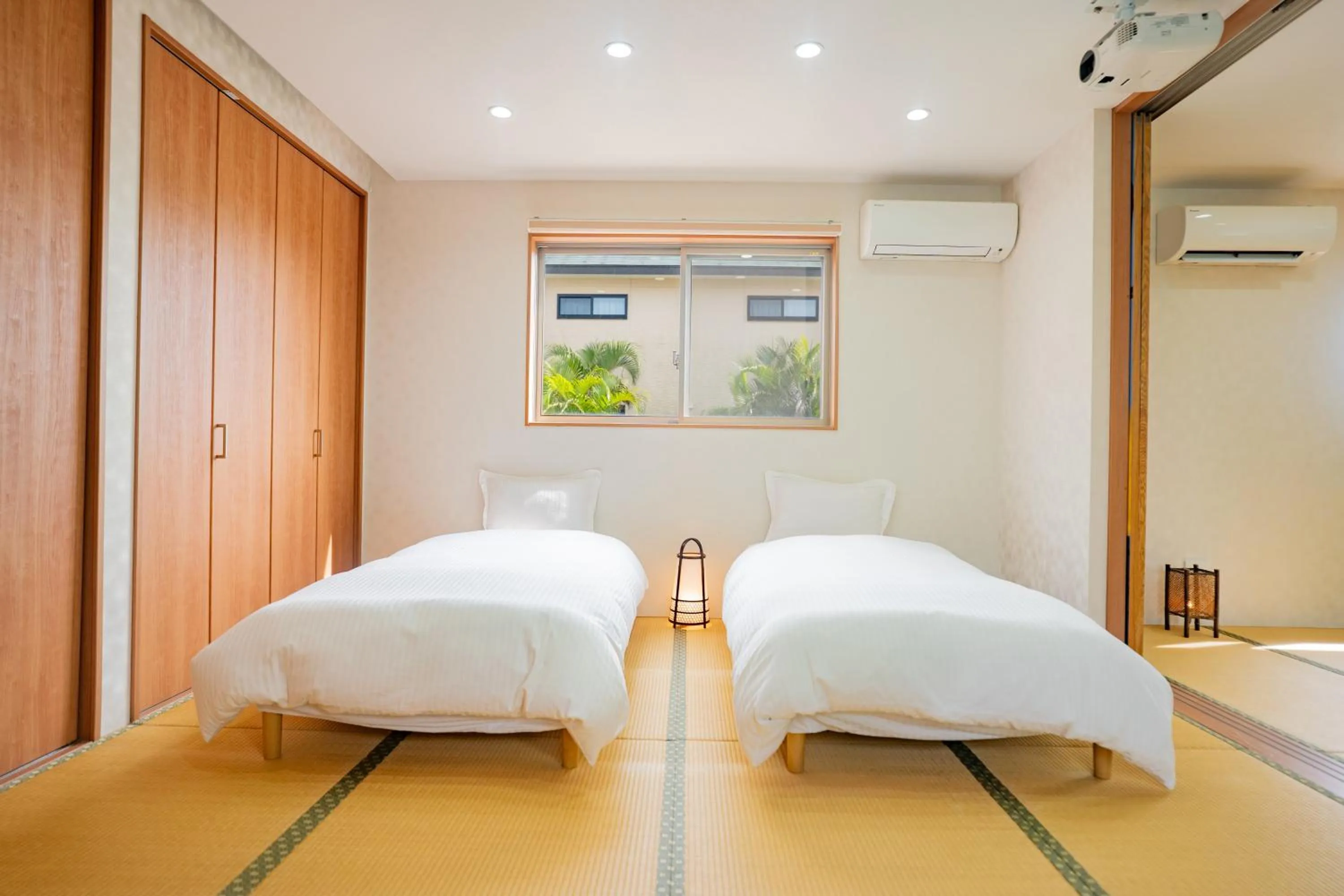 Bed in Yamagata Ryukyu Hatago Onnason with pool
