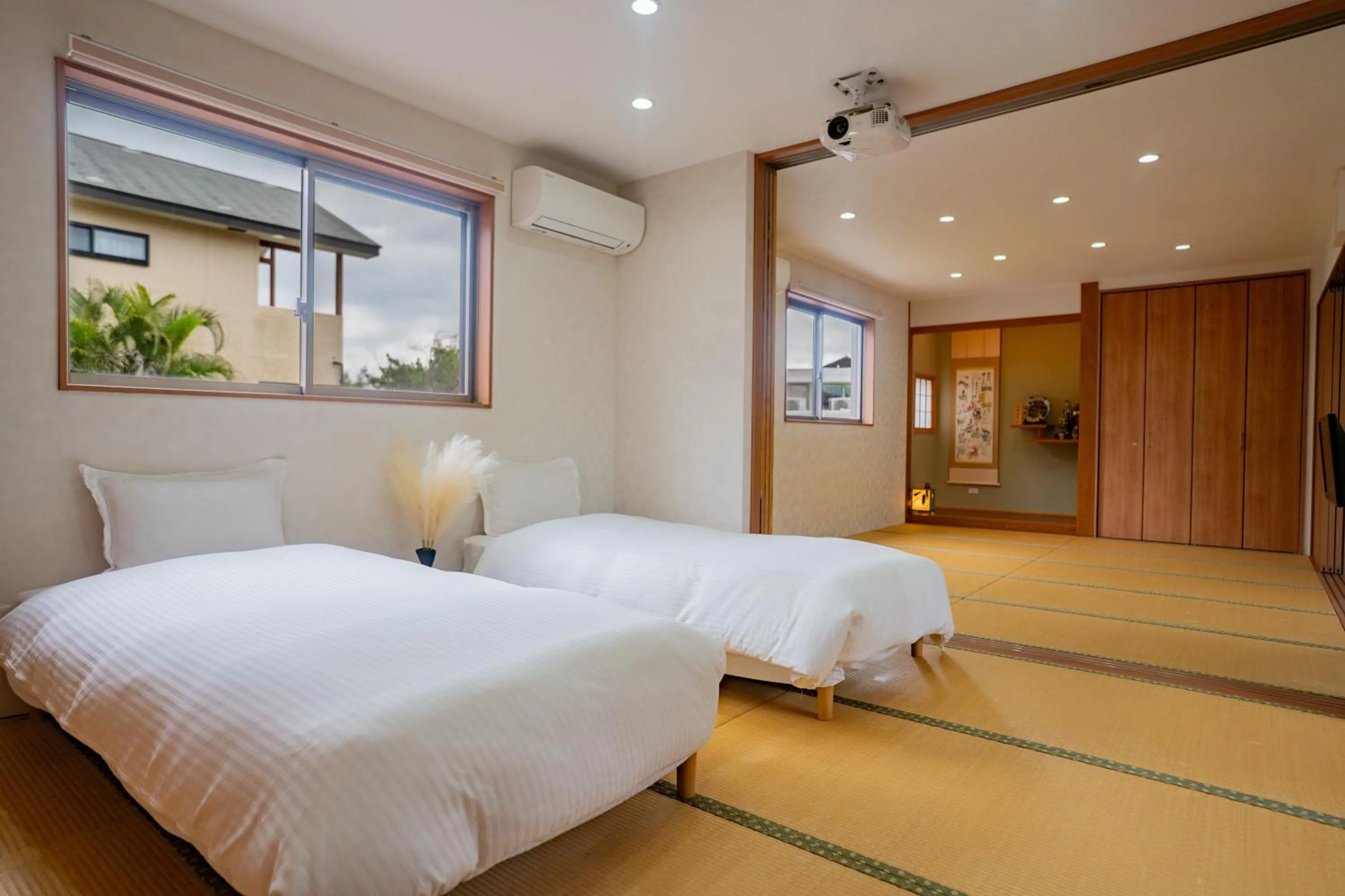 Bed in Yamagata Ryukyu Hatago Onnason with pool