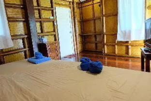 Bed in Koh kood Neverland beach resort