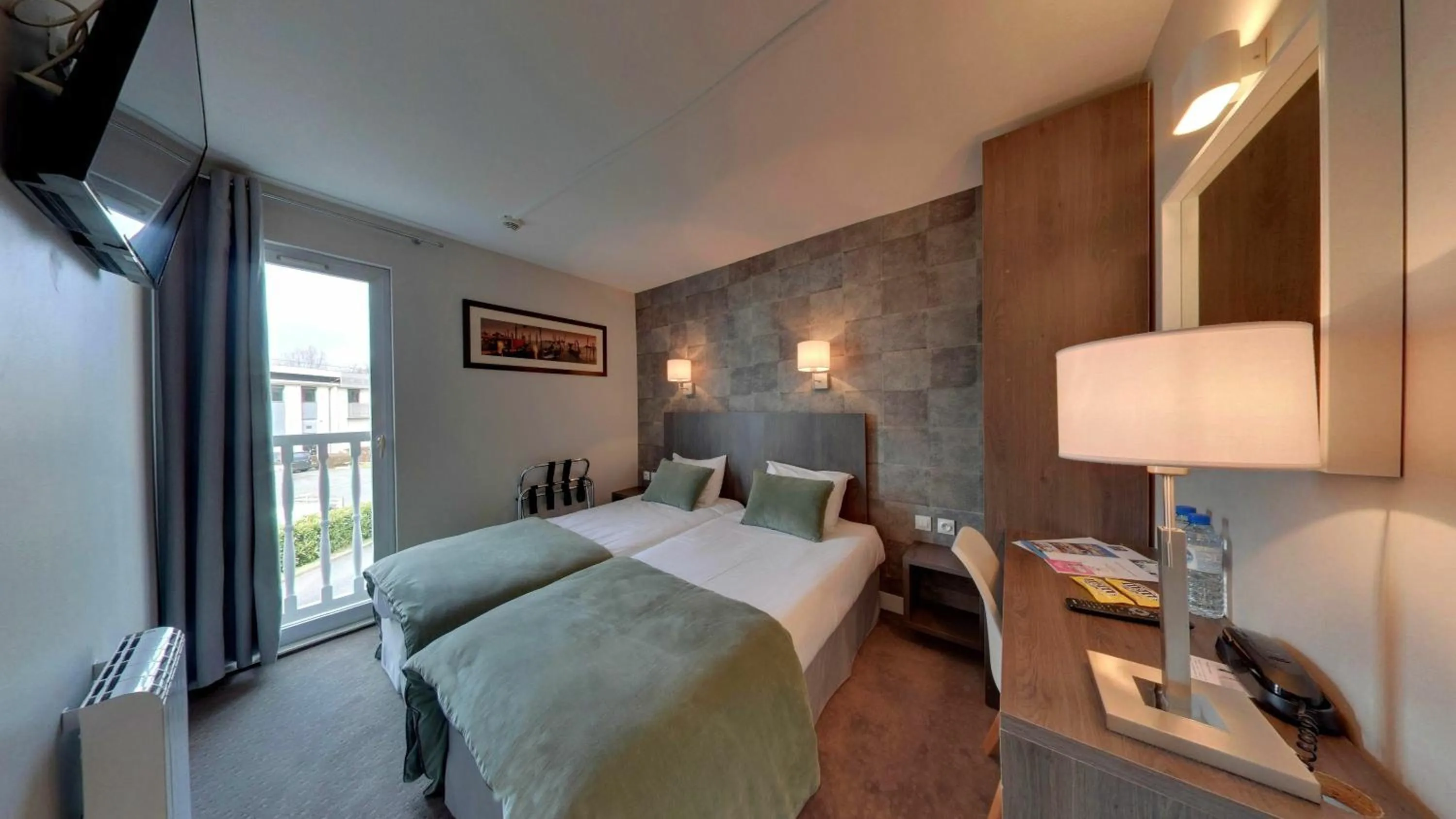 Bed in Hotel Acadie Les Ulis