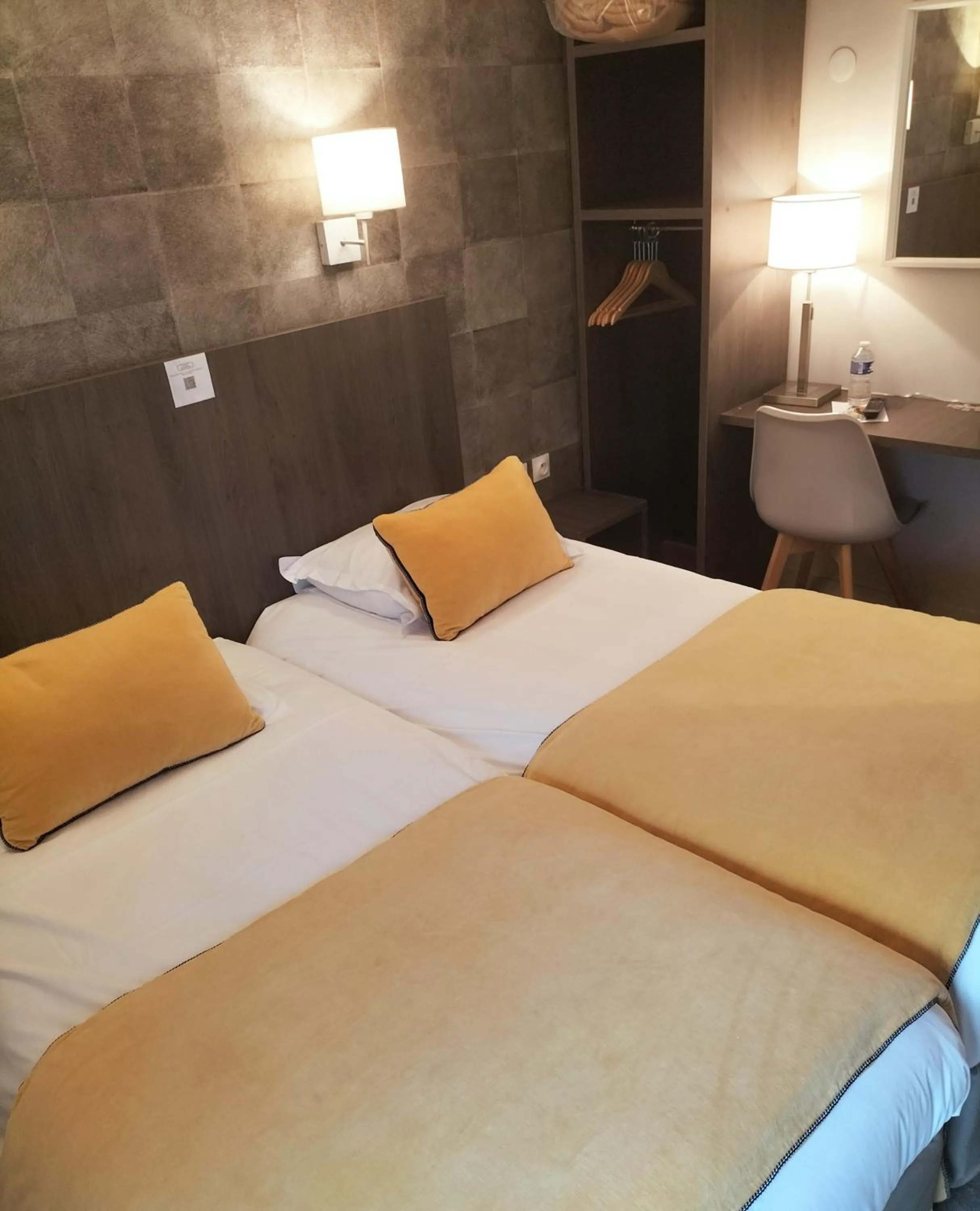 Bed in Hotel Acadie Les Ulis