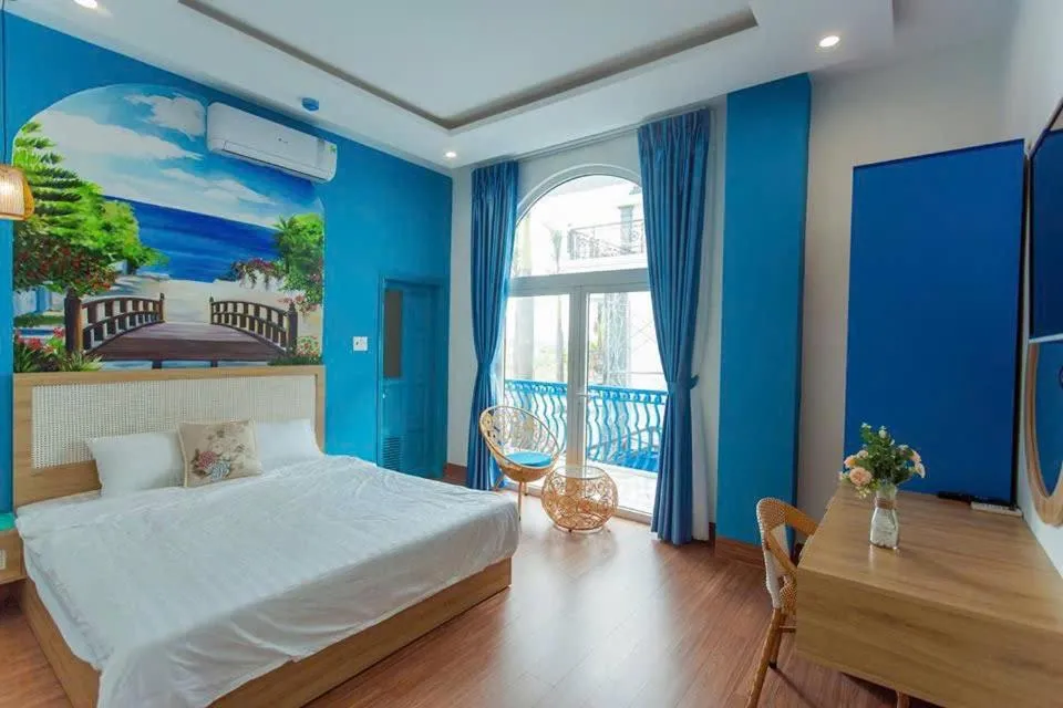 Bed in Santorini House and Coffee