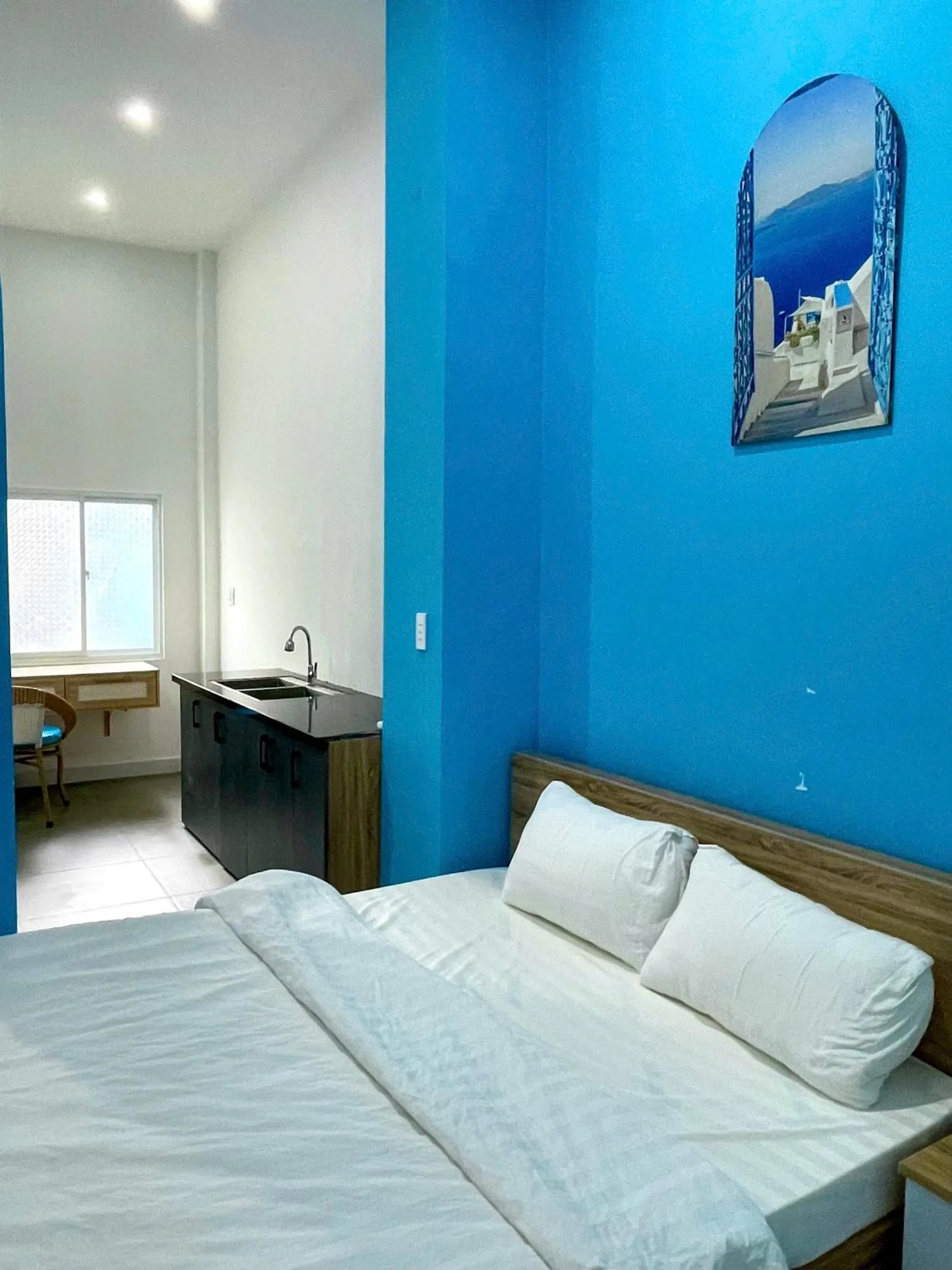 Bed in Santorini House and Coffee