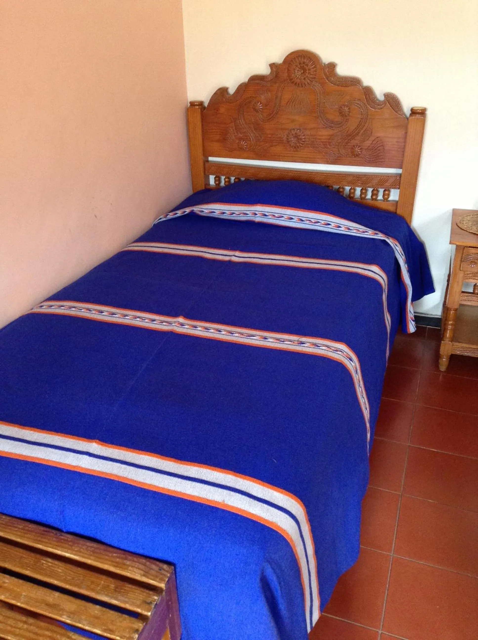 Bed in Posada de la Salud