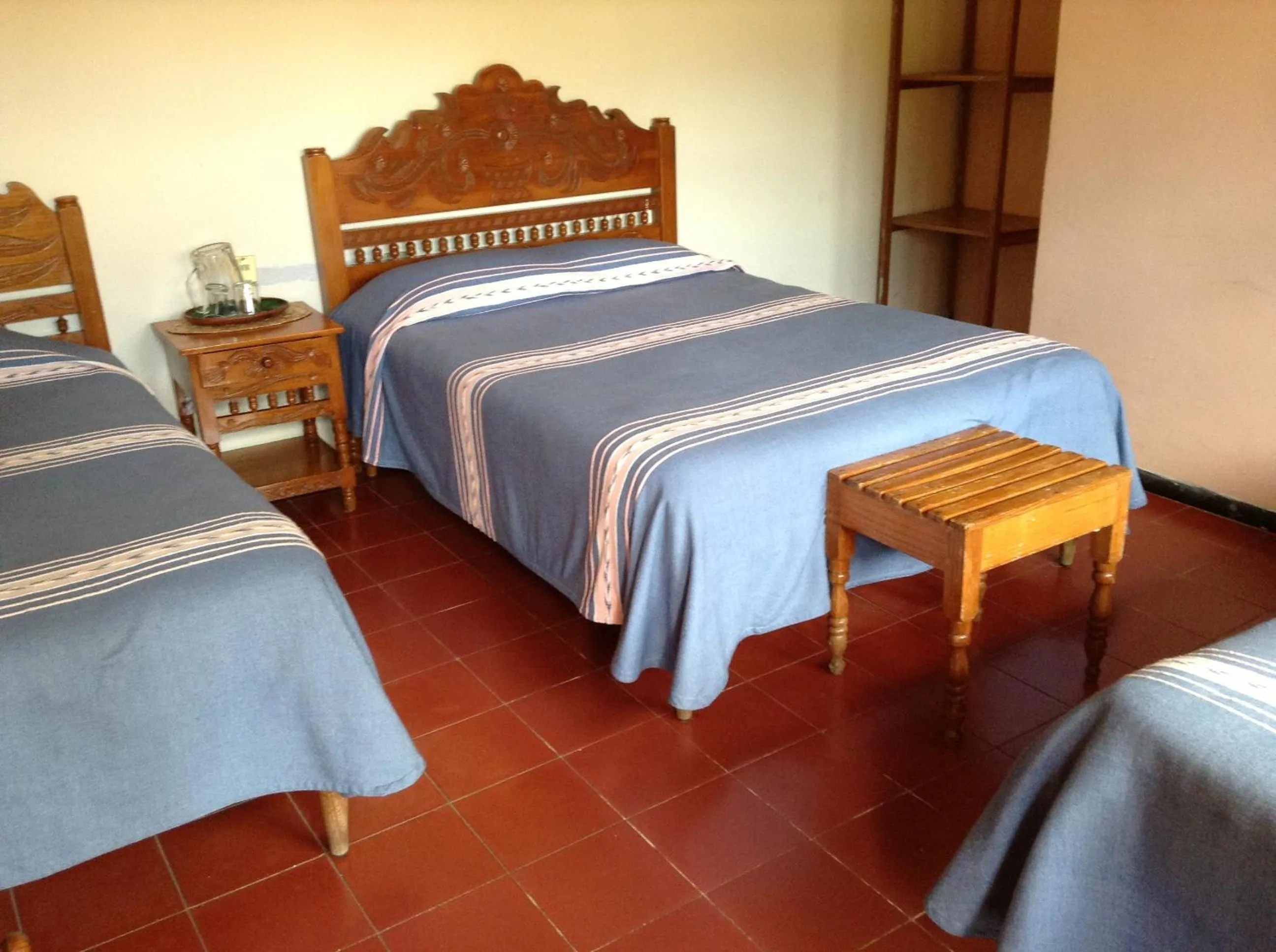 Bed in Posada de la Salud
