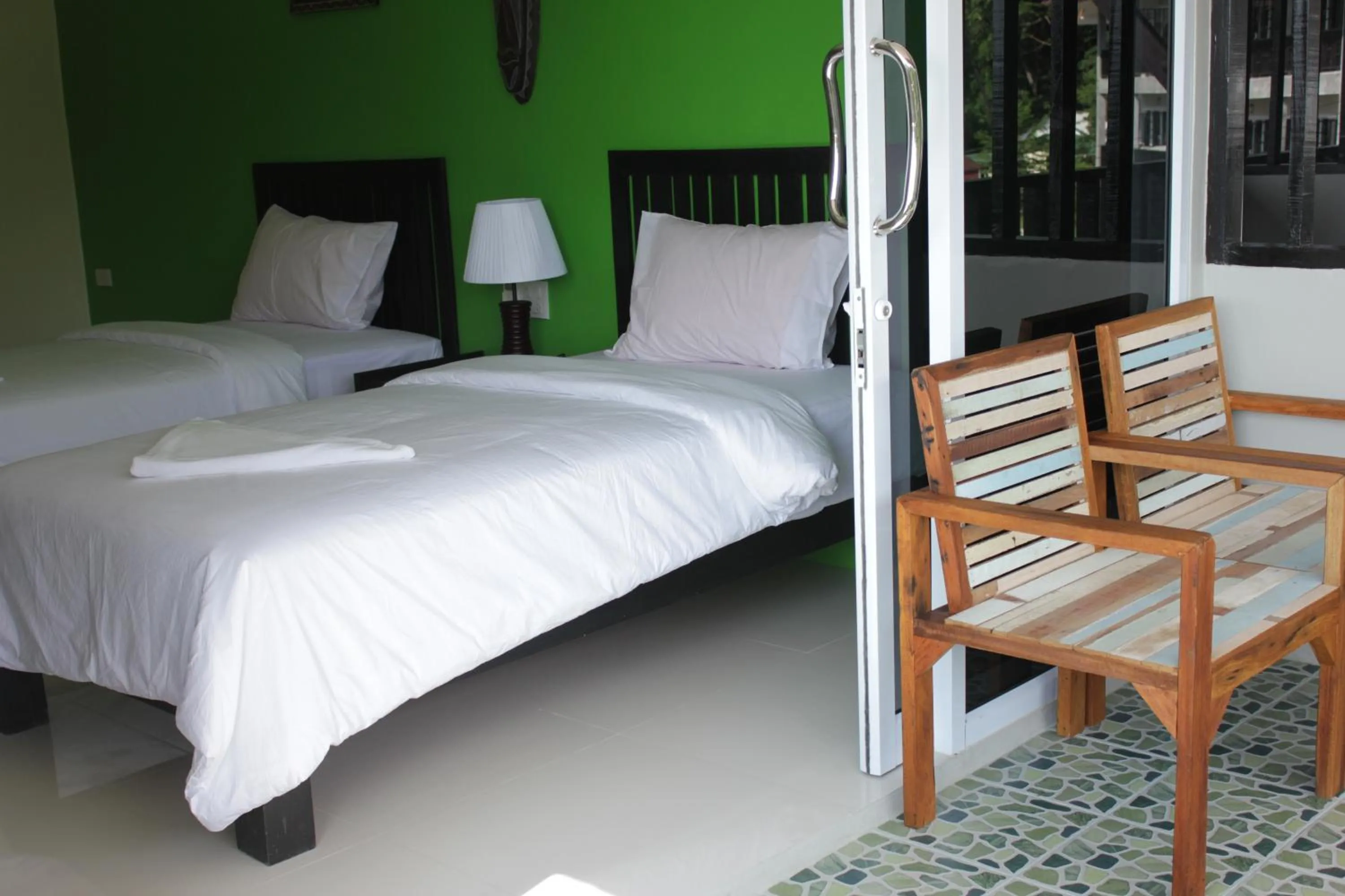 Balcony/Terrace, Bed in Nadapa Resort