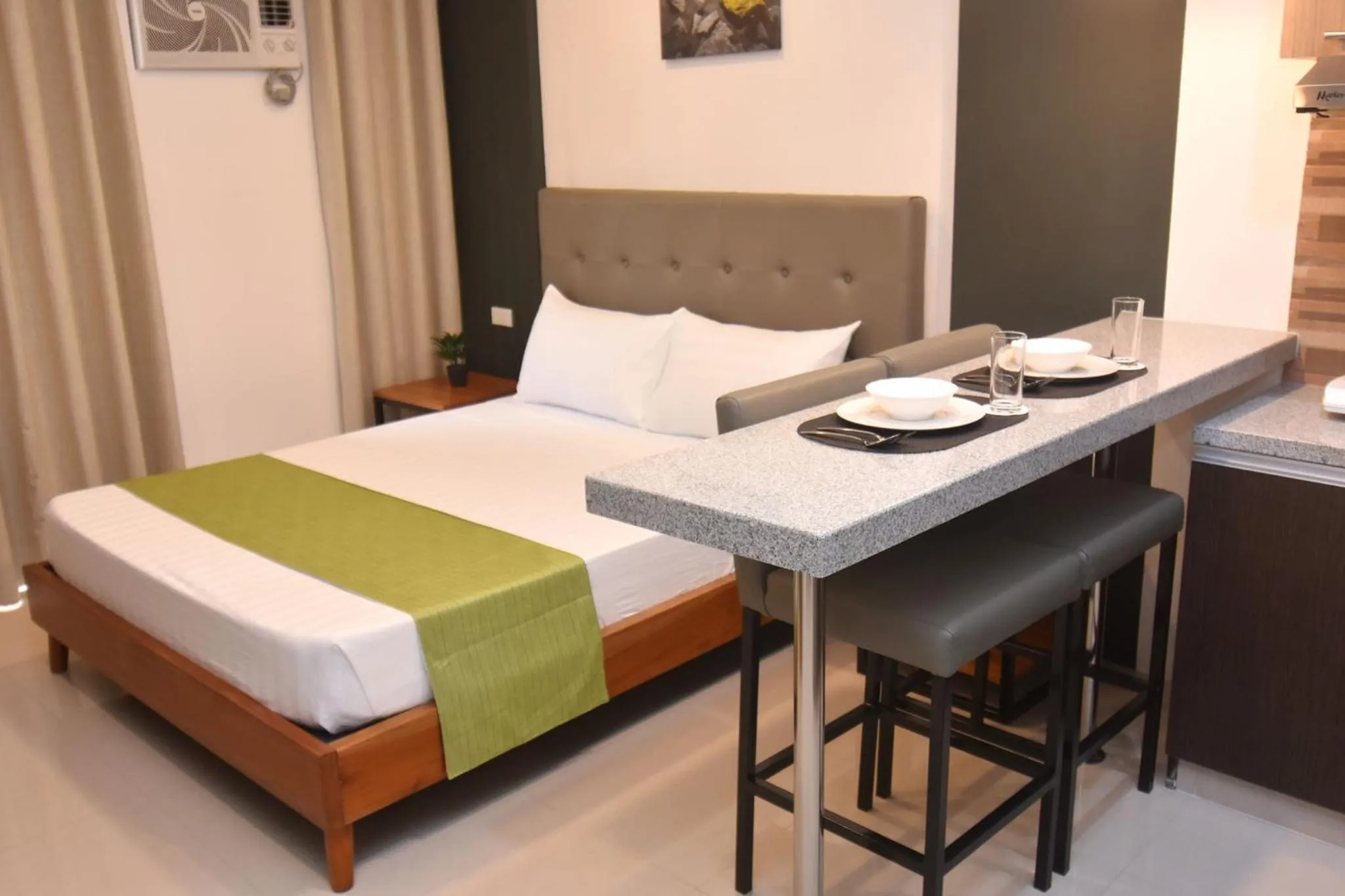 Bed in Andeo Suites