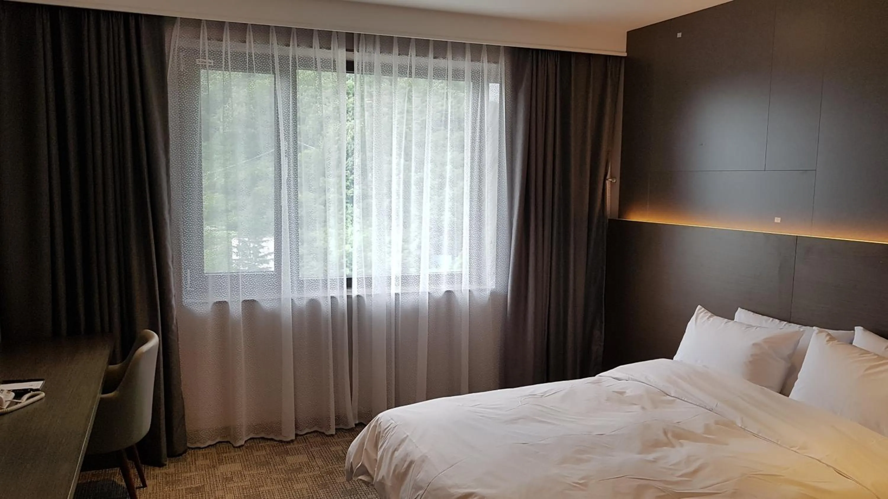 Bed in Mudeung Park Hotel