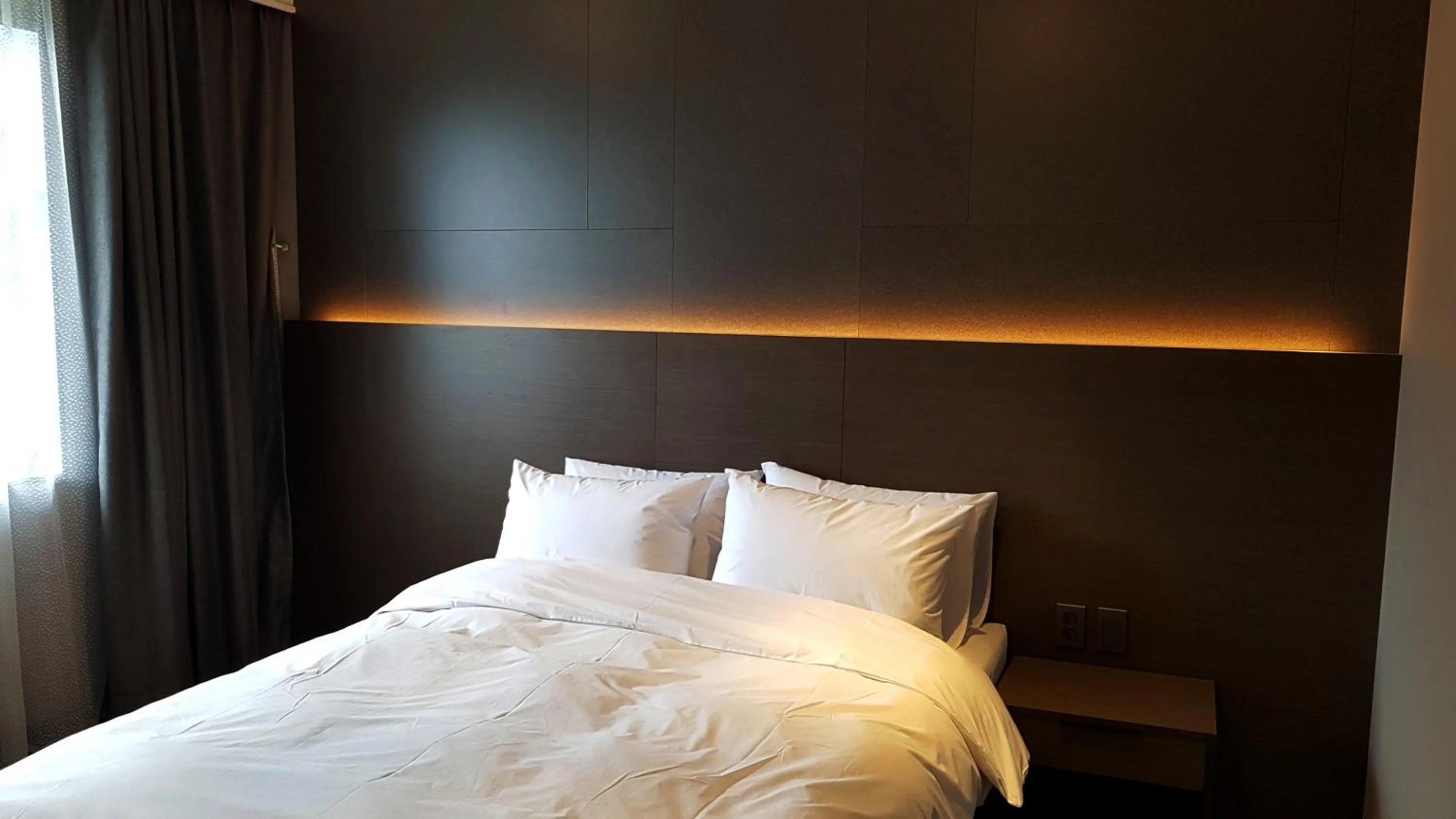 Bed in Mudeung Park Hotel