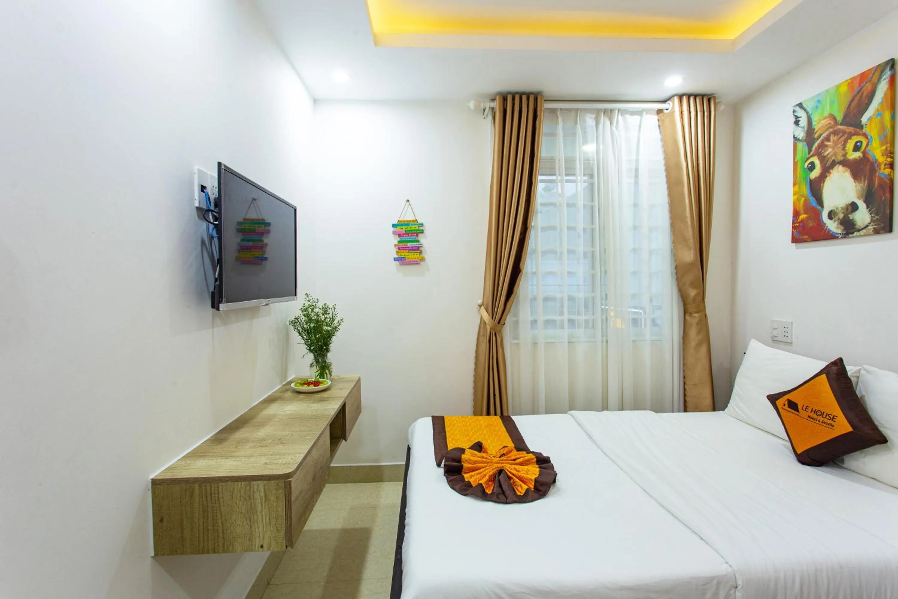 Bed in Le House Hotel and Studio