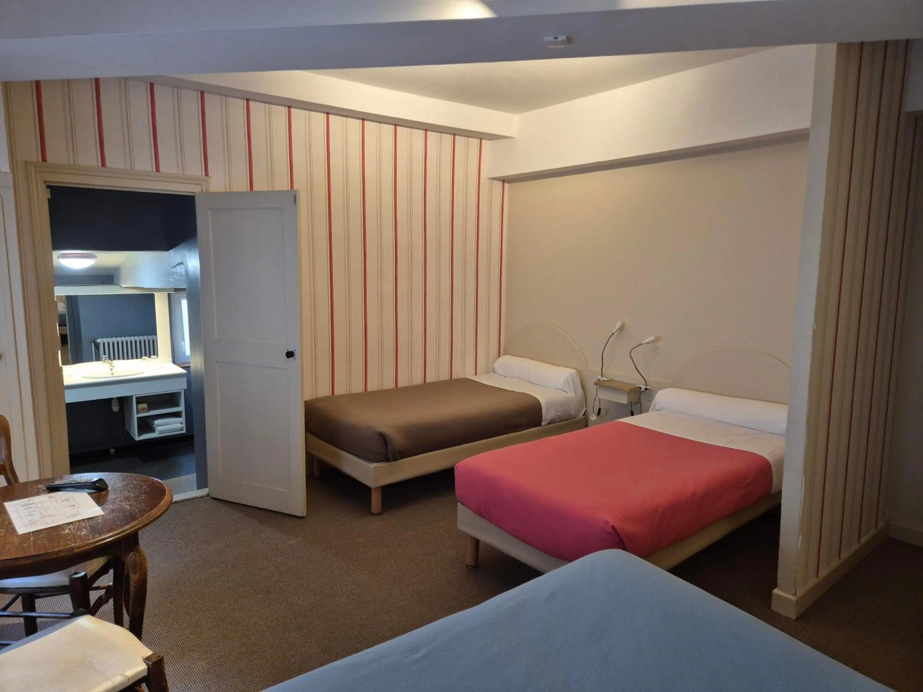 Bed in Hotel Saint Jean