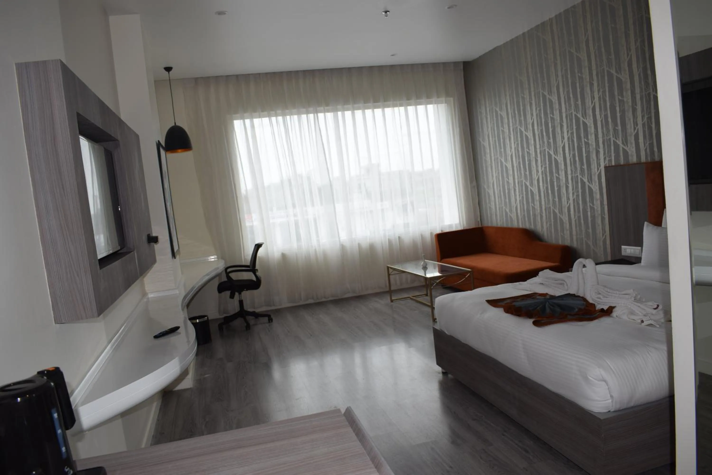 Photo of the whole room, Bed in Hotel Deep Clarks Inn Lucknow