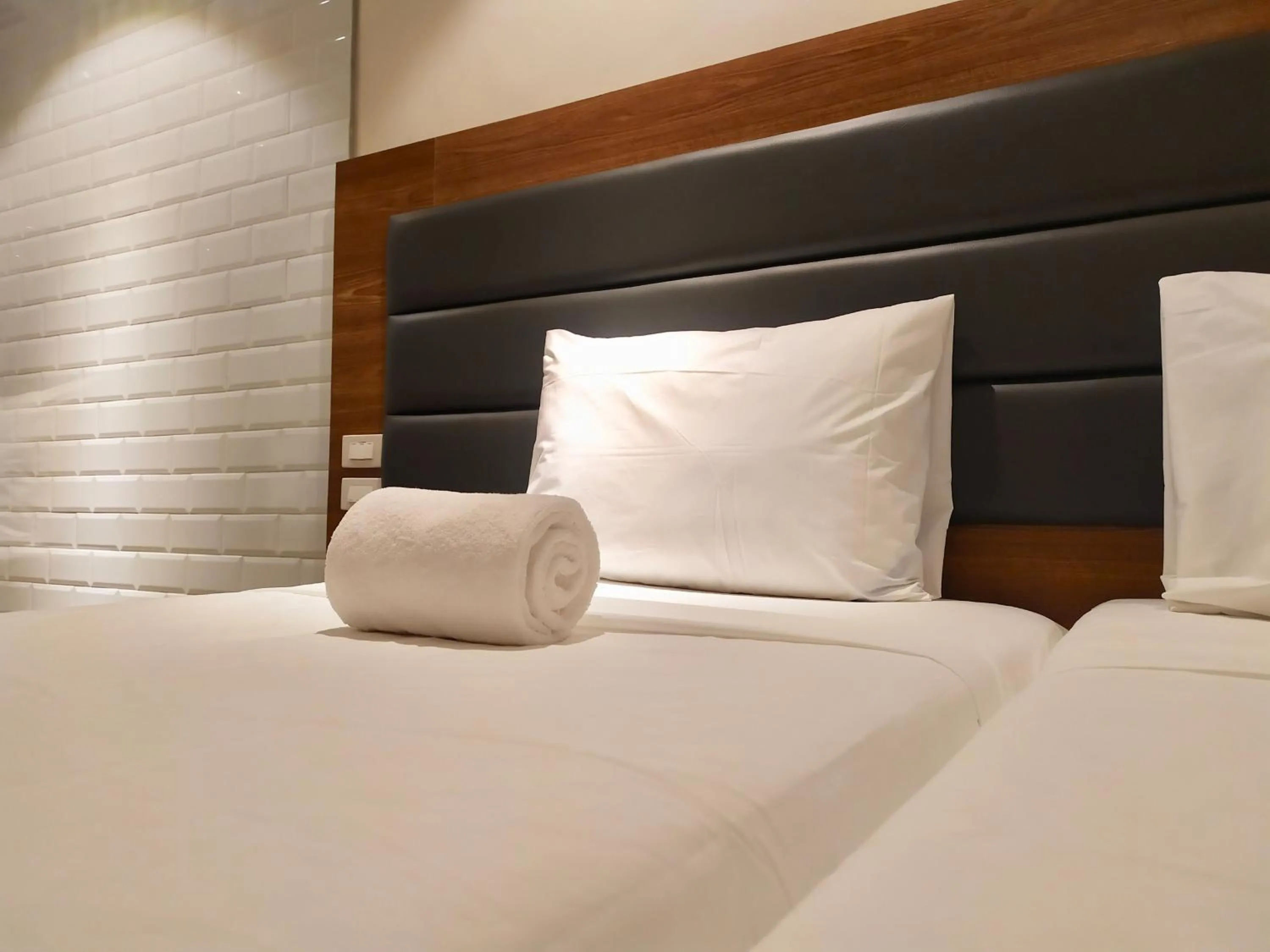 Bed in The Hub District Garden Suites