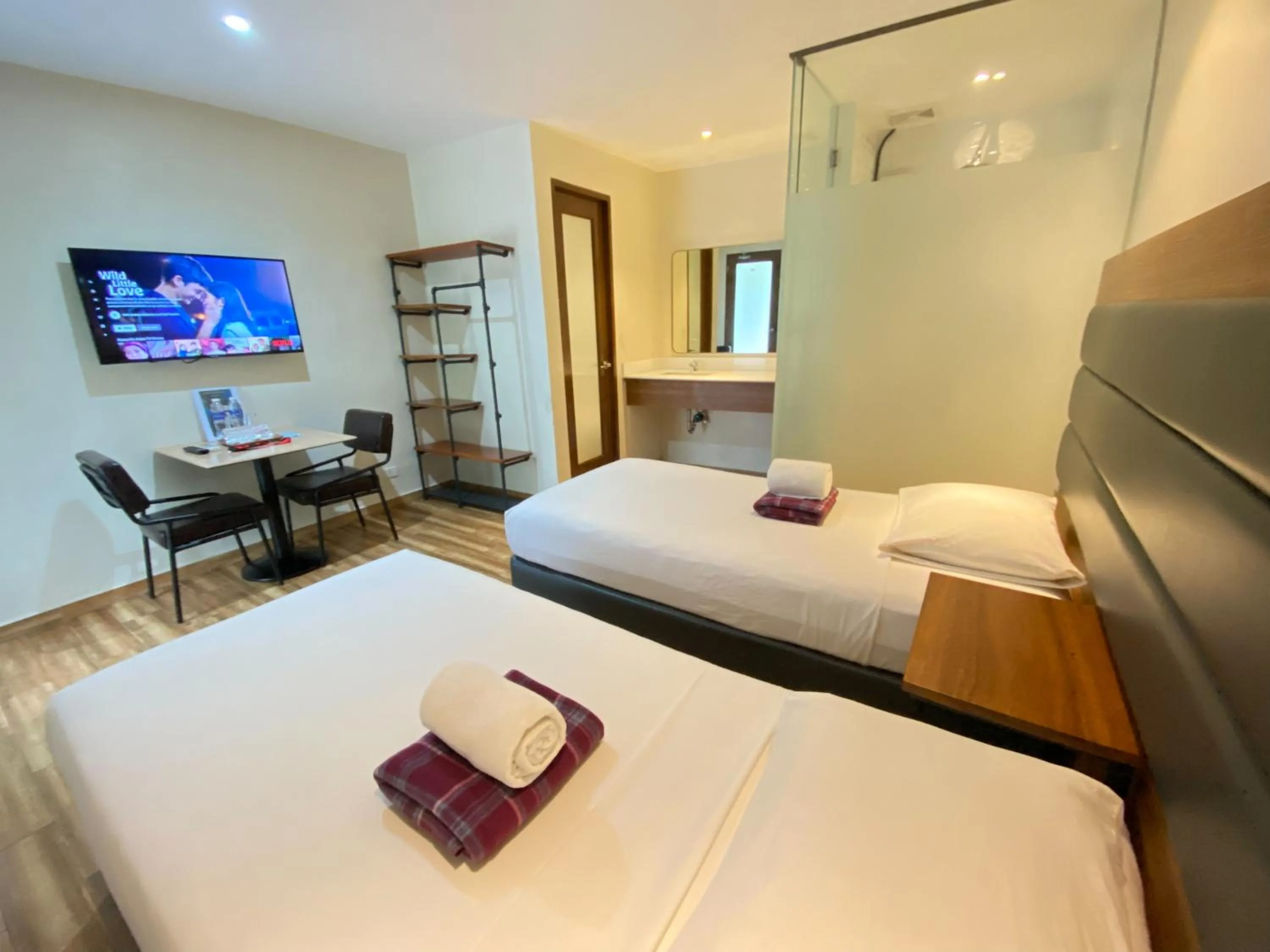 Bed in The Hub District Garden Suites