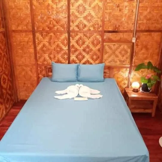 Bed in SHUKRAN Apartelle