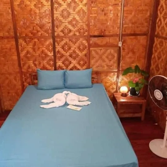 Bed in SHUKRAN Apartelle