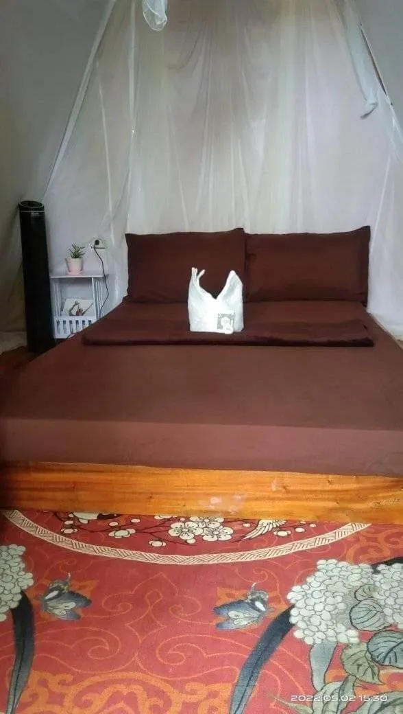 Bed in SHUKRAN Apartelle