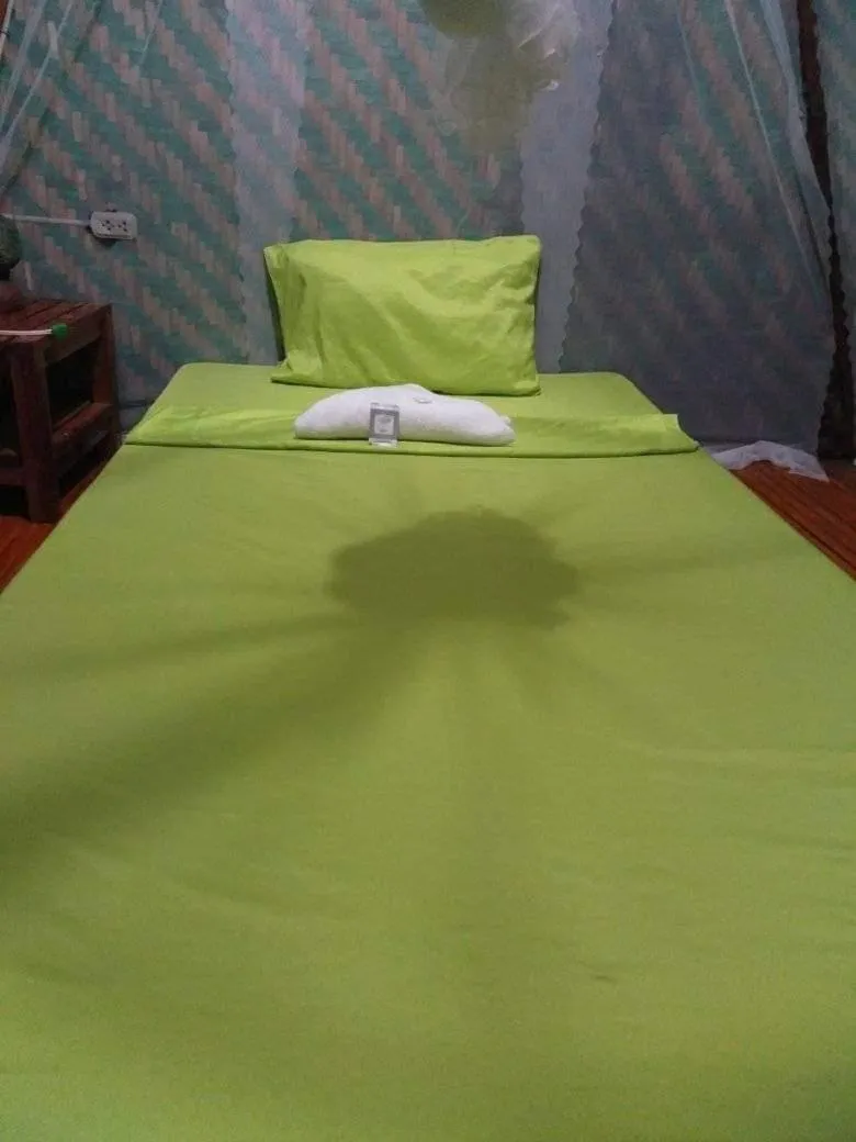 Bed in SHUKRAN Apartelle