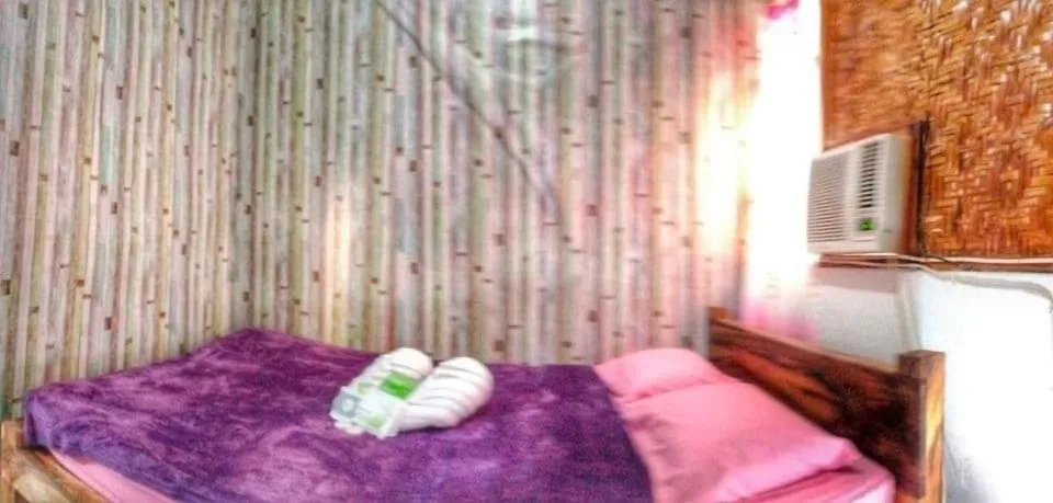 Bed in SHUKRAN Apartelle