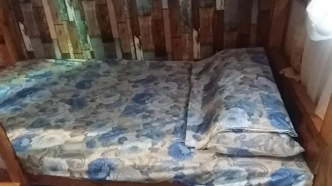 Bed in SHUKRAN Apartelle