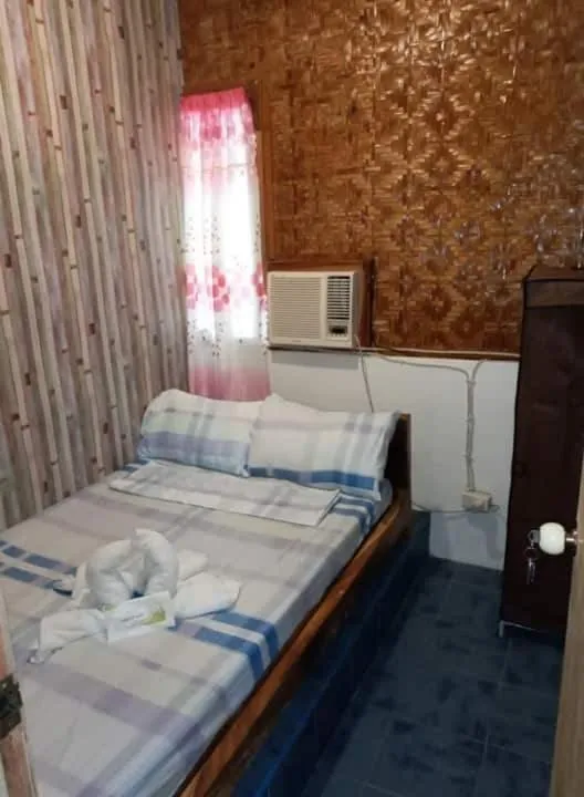 Bedroom, Bed in SHUKRAN Apartelle