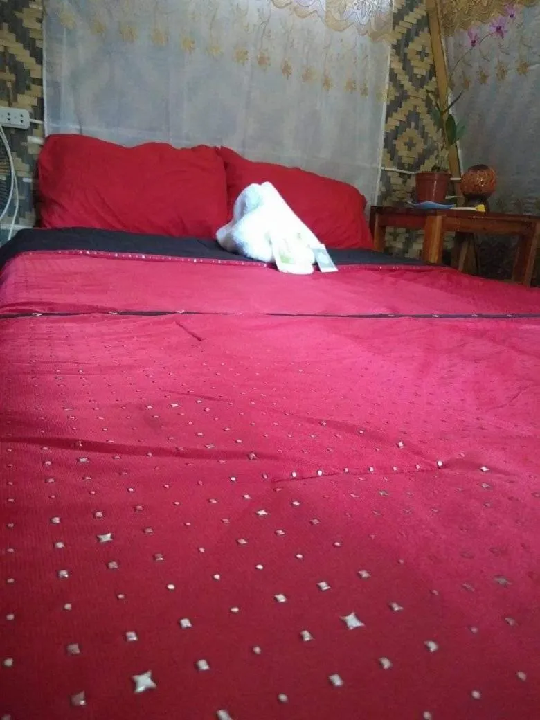 Bed in SHUKRAN Apartelle