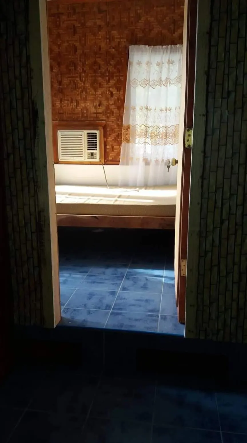 Bed in SHUKRAN Apartelle