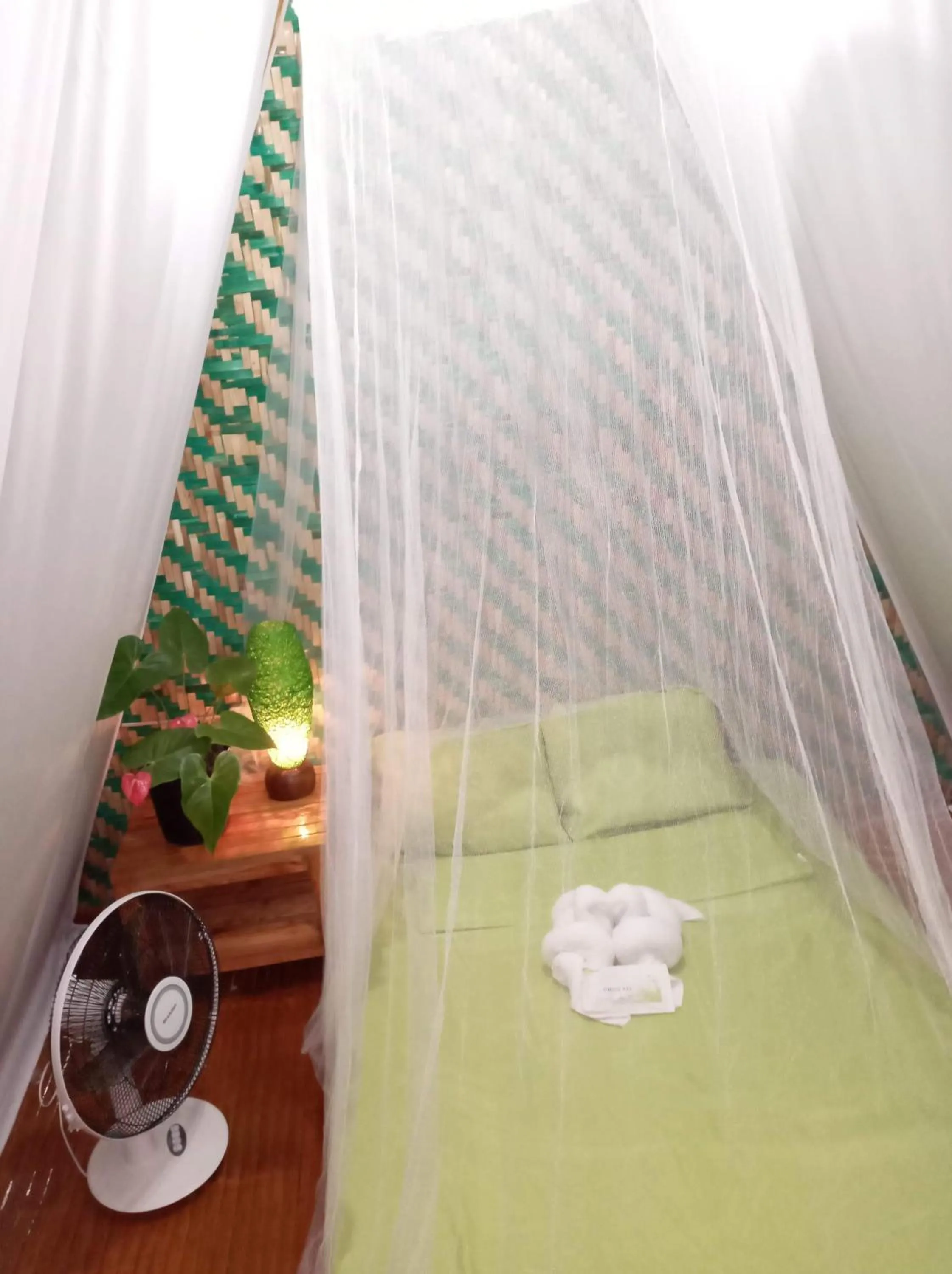 Bed in SHUKRAN Apartelle