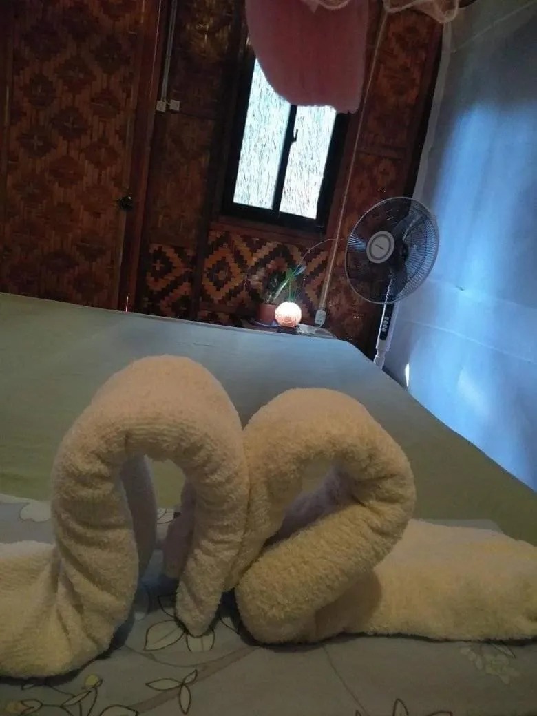 Bed in SHUKRAN Apartelle