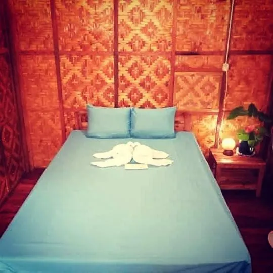 Bed in SHUKRAN Apartelle