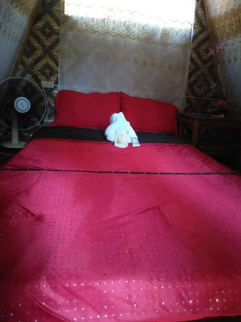 Bed in SHUKRAN Apartelle