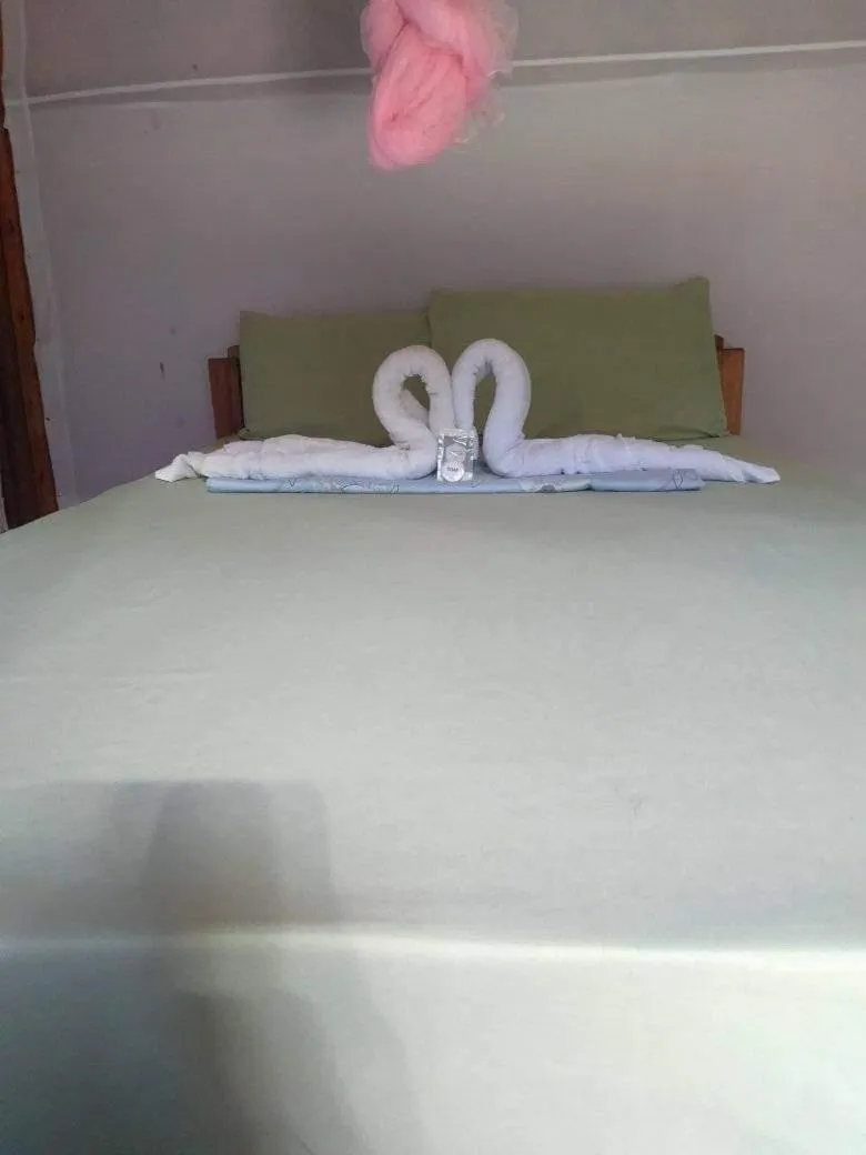 Bed in SHUKRAN Apartelle