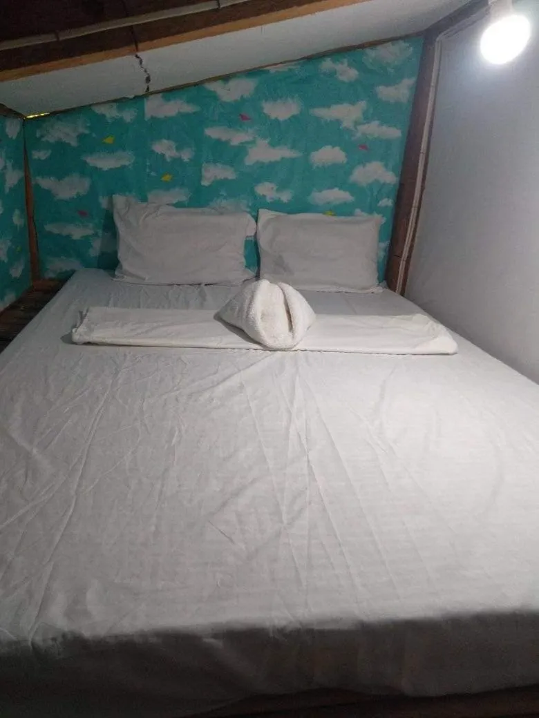 Bed in SHUKRAN Apartelle