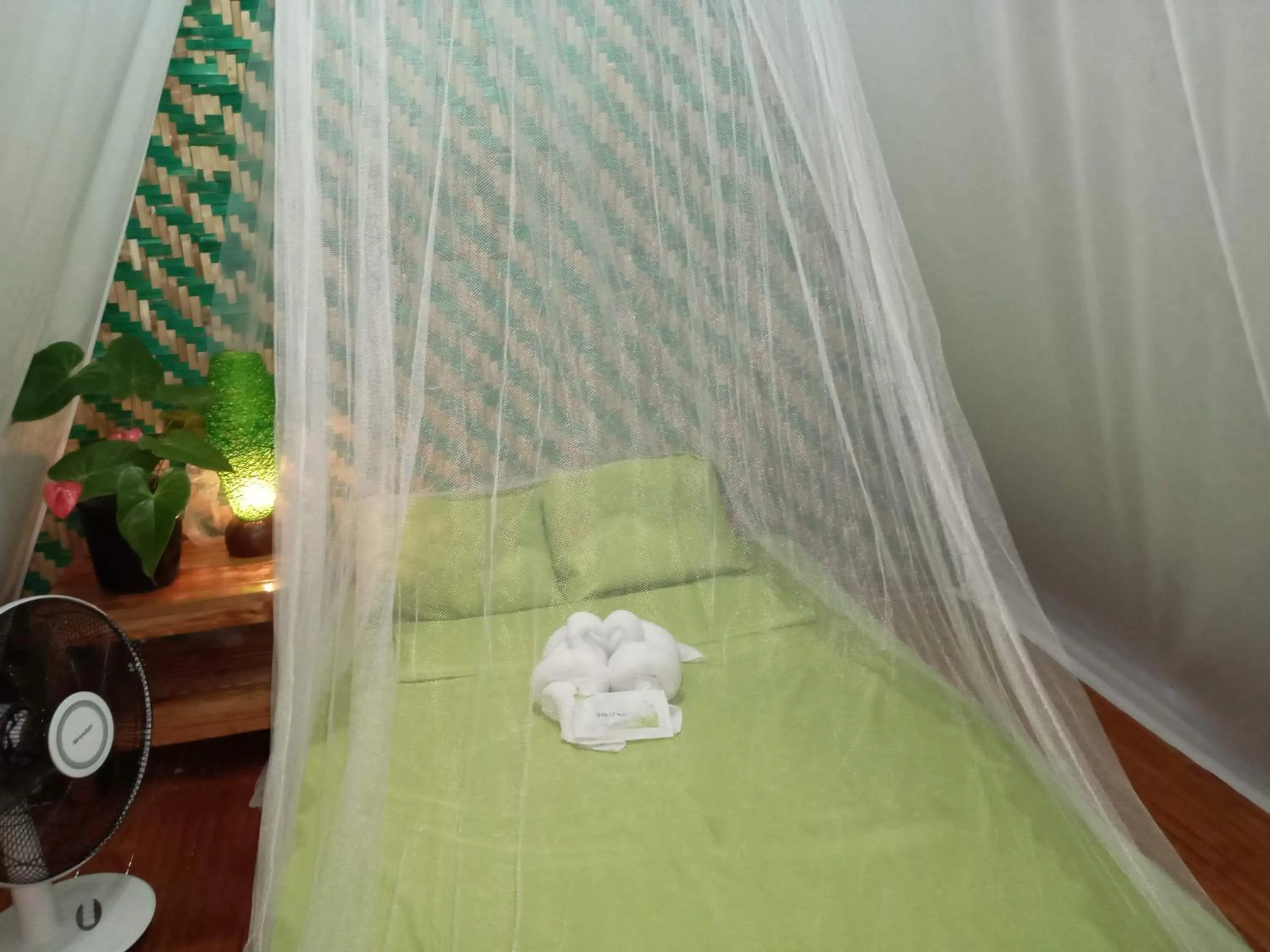 Bed in SHUKRAN Apartelle