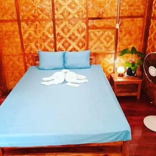 Bed in SHUKRAN Apartelle